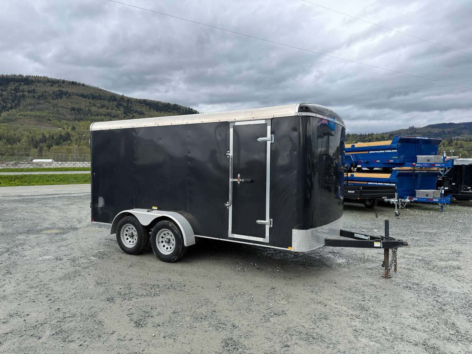 Photo of Pre Owned Used 2017 TNT 7x14 Cargo Enclosed Trailer 5000lbs GVW Black w/ Rear Barn Doors