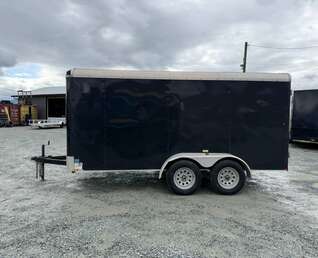 Thumbnail Photo of Pre Owned Used 2017 TNT 7x14 Cargo Enclosed Trailer 5000lbs GVW Black w/ Rear Barn Doors