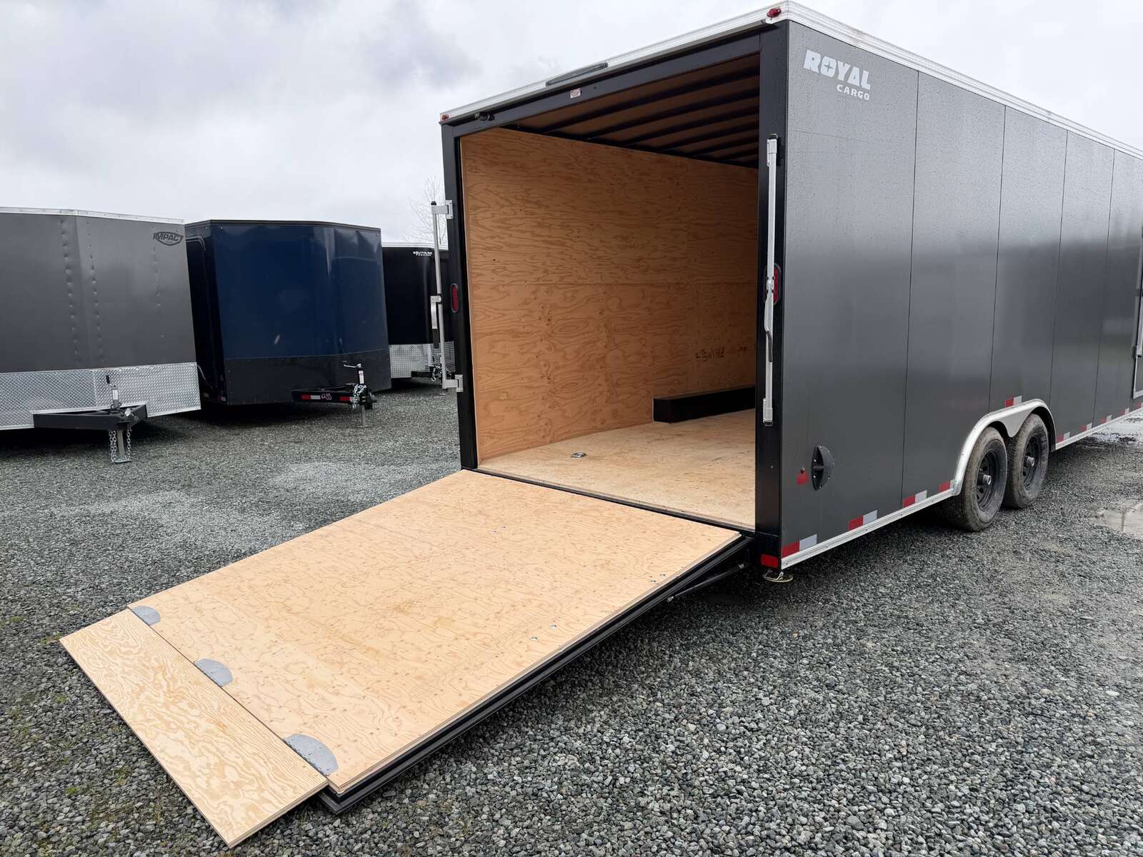 Photo of **SCRATCH SALE** 2026 Royal Cargo 8.5x24 V Nose Car Hauler Cargo / Enclosed Trailer 11,400lb GVW Charcoal Grey Ramp Door Extra Height (GSR)