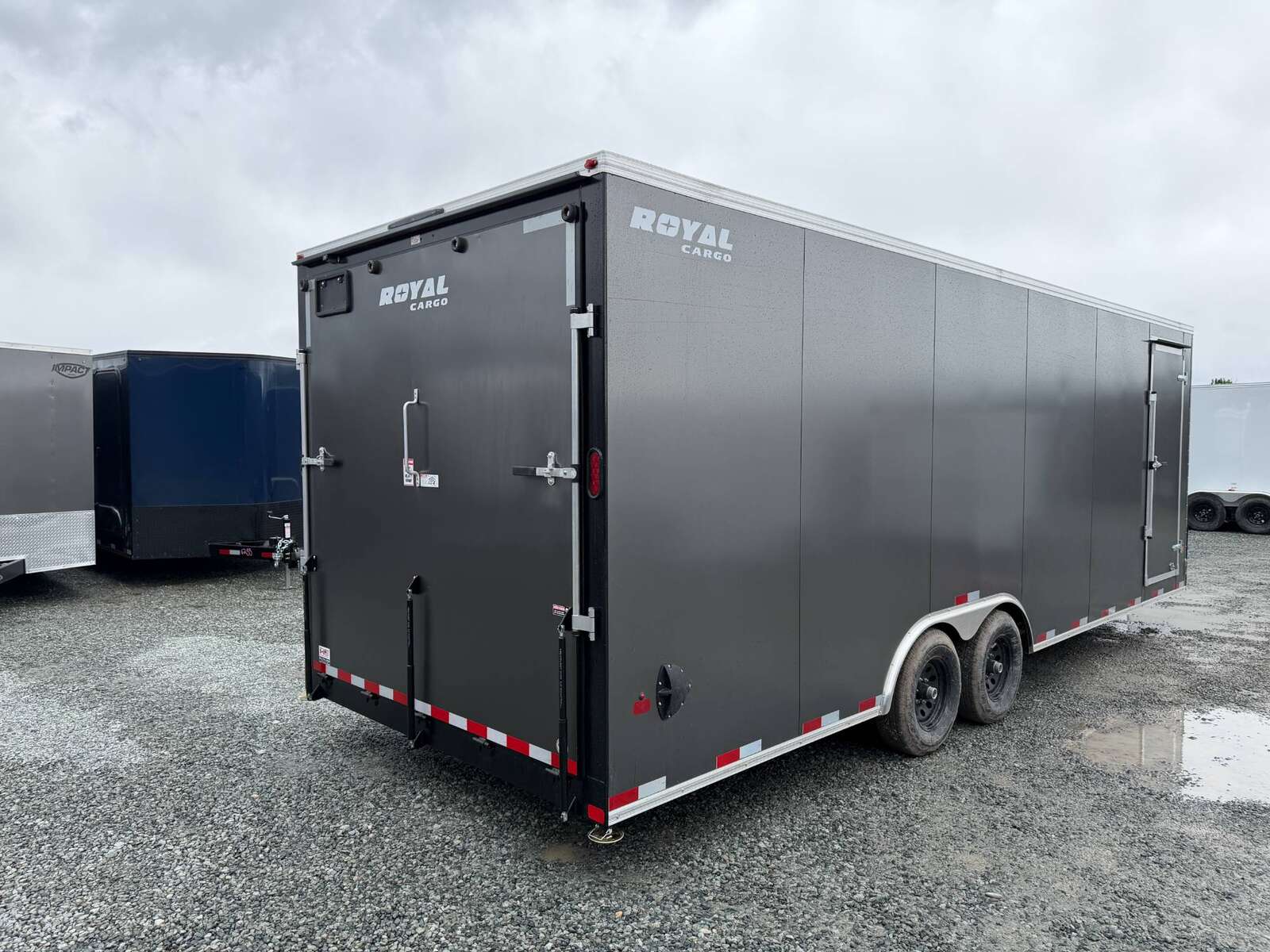 Photo of **SCRATCH SALE** 2026 Royal Cargo 8.5x24 V Nose Car Hauler Cargo / Enclosed Trailer 11,400lb GVW Charcoal Grey Ramp Door Extra Height (GSR)