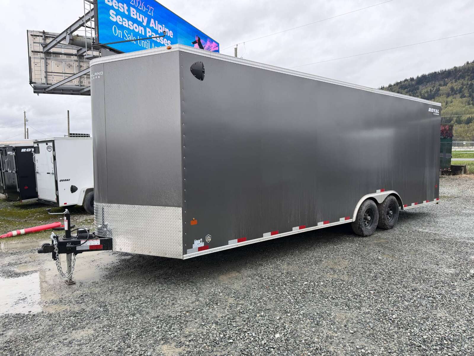 Photo of **SCRATCH SALE** 2026 Royal Cargo 8.5x24 V Nose Car Hauler Cargo / Enclosed Trailer 11,400lb GVW Charcoal Grey Ramp Door Extra Height (GSR)