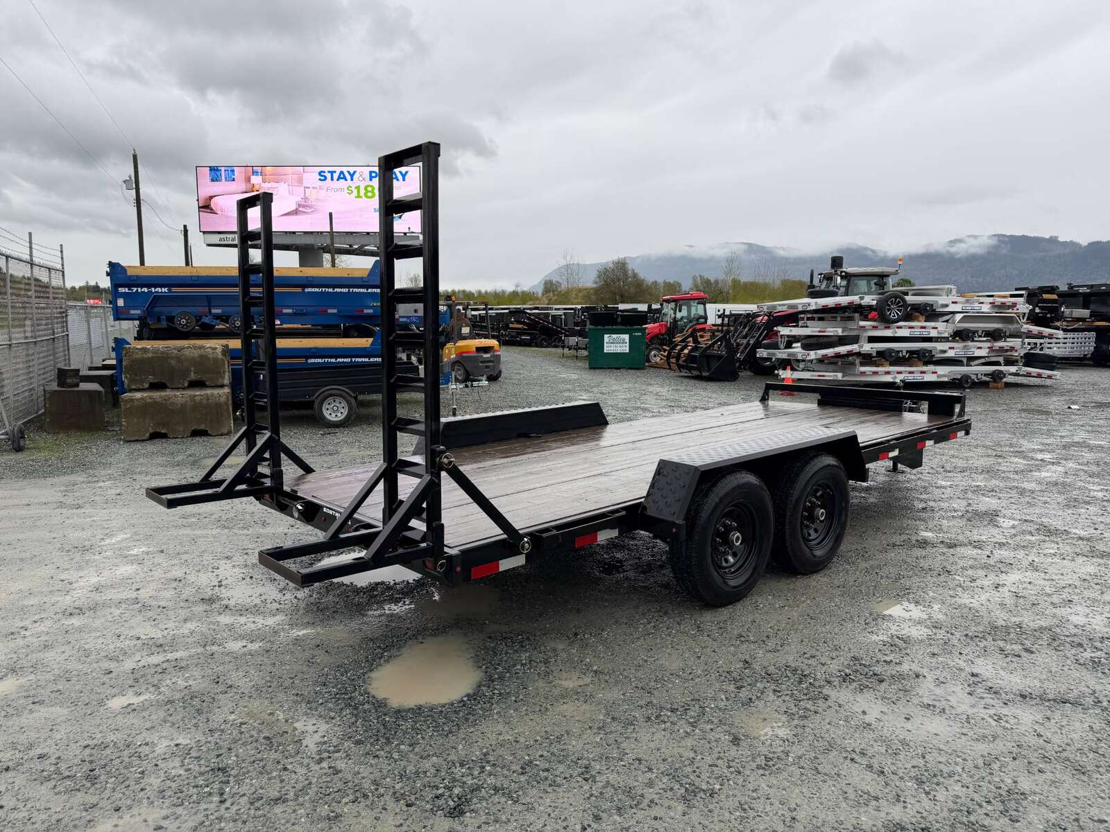 Photo of Pre Owned Used 2024 Southland 7X18 15,400LB GVW Equipment Flat Deck Trailer w/ Stand Up Ramps