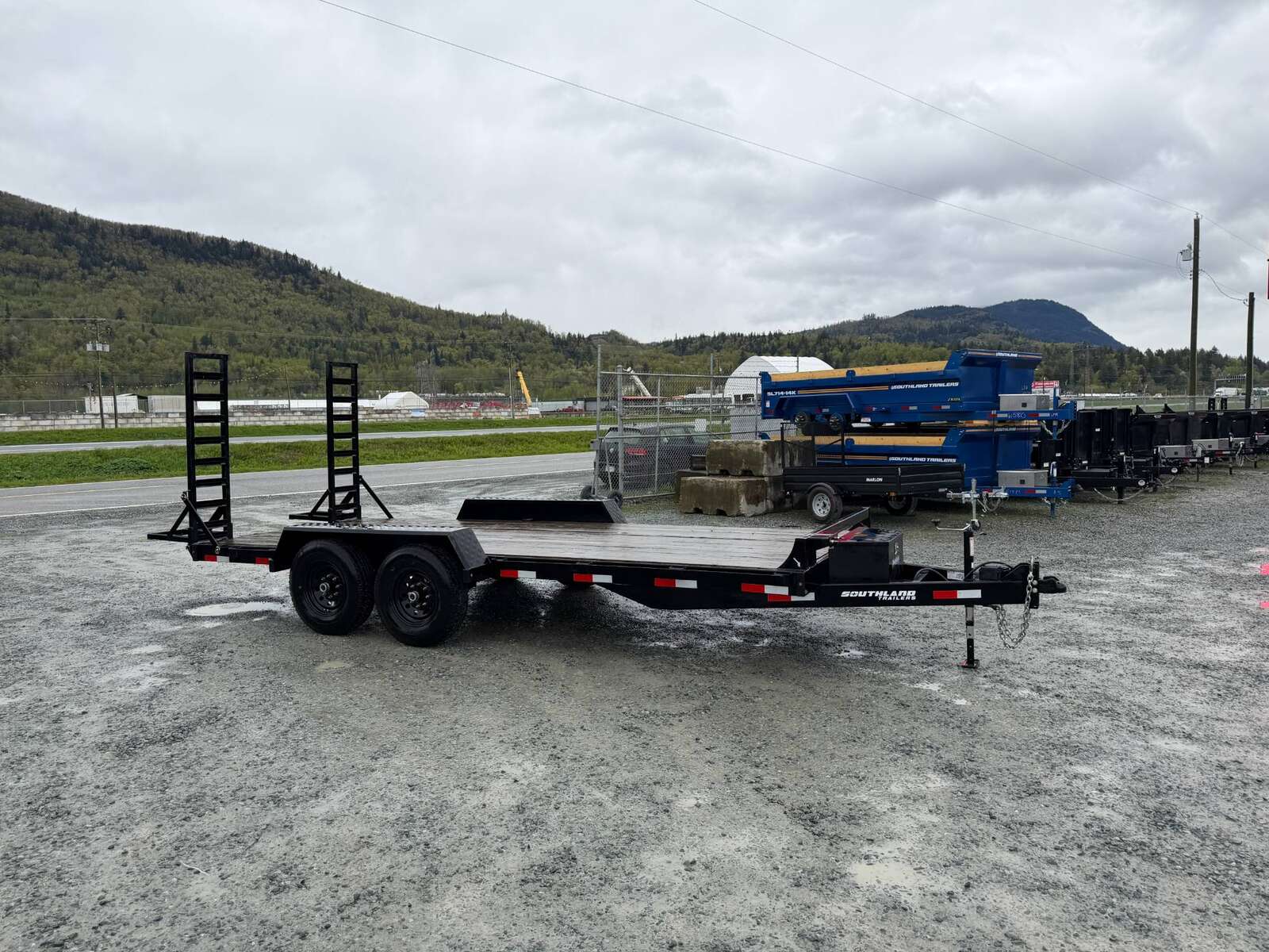 Photo of Pre Owned Used 2024 Southland 7X18 15,400LB GVW Equipment Flat Deck Trailer w/ Stand Up Ramps
