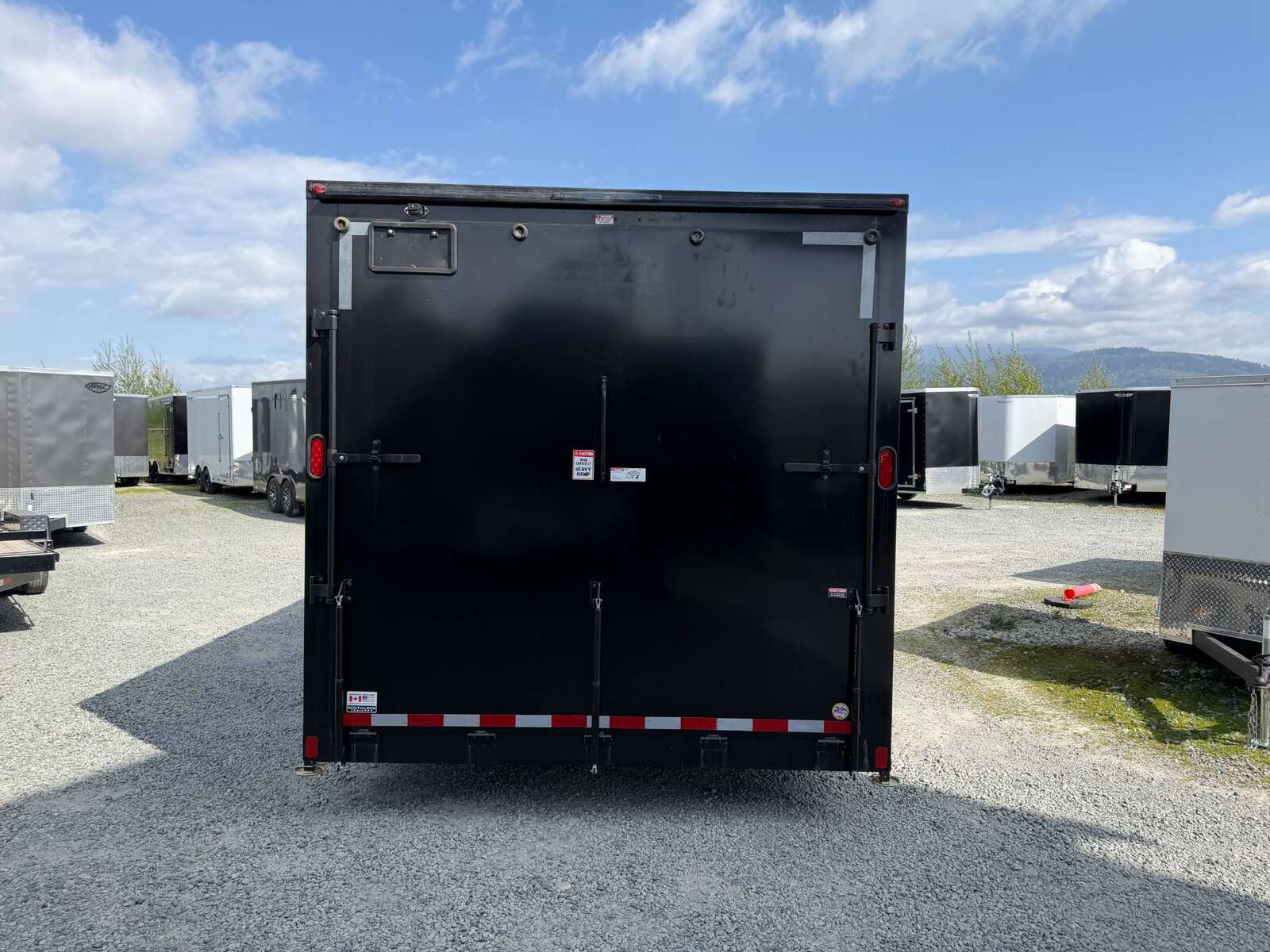 Photo of 2026 Royal Cargo 8.5x24 V Nose Car Hauler Cargo / Enclosed Trailer Blackout 11,400lb GVW Satin Black Ramp Door Extra Height (GSR)
