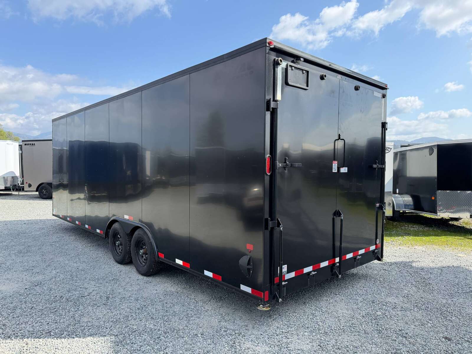 Photo of 2026 Royal Cargo 8.5x24 V Nose Car Hauler Cargo / Enclosed Trailer Blackout 11,400lb GVW Satin Black Ramp Door Extra Height (GSR)