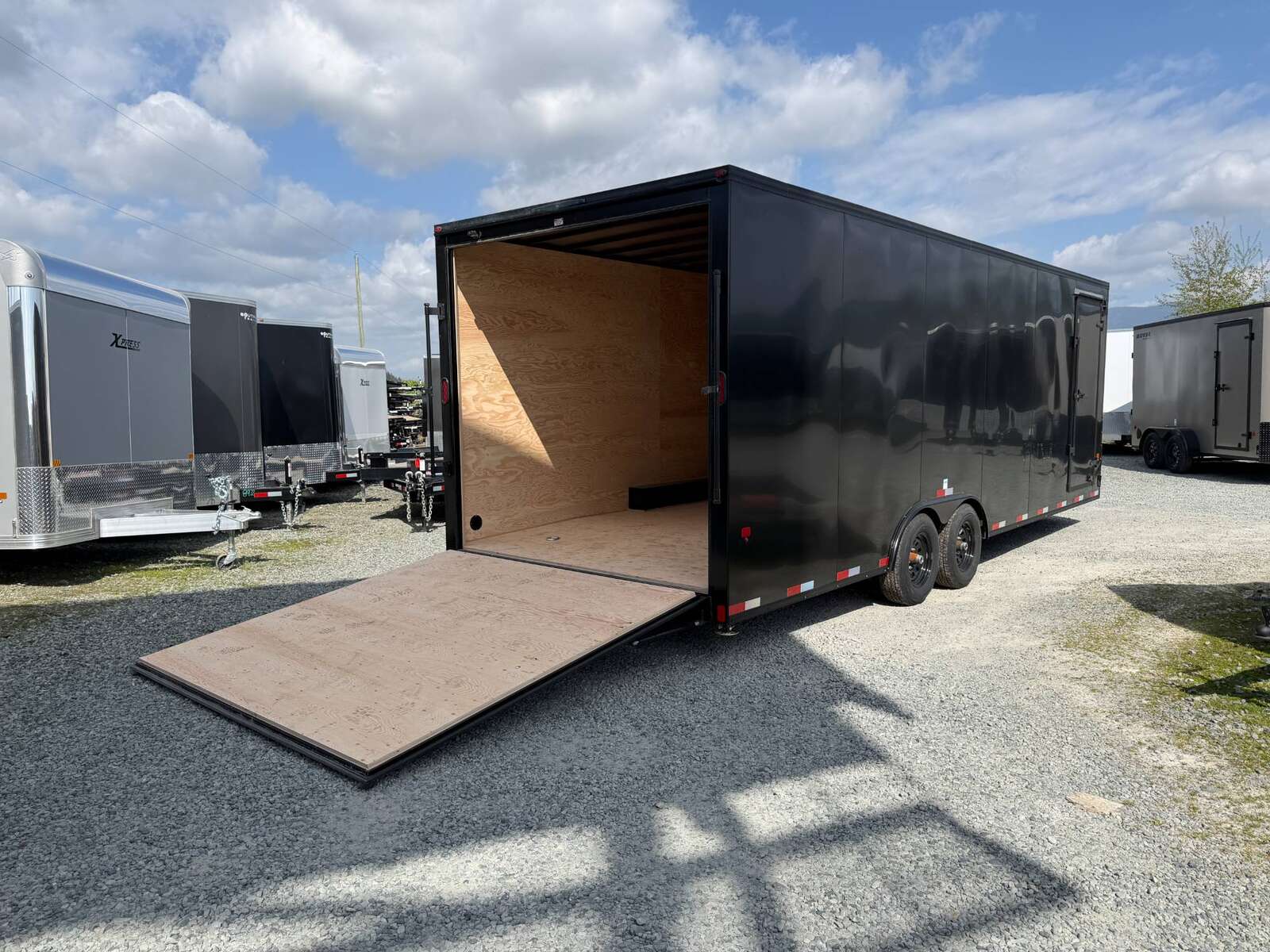 Photo of 2026 Royal Cargo 8.5x24 V Nose Car Hauler Cargo / Enclosed Trailer Blackout 11,400lb GVW Satin Black Ramp Door Extra Height (GSR)