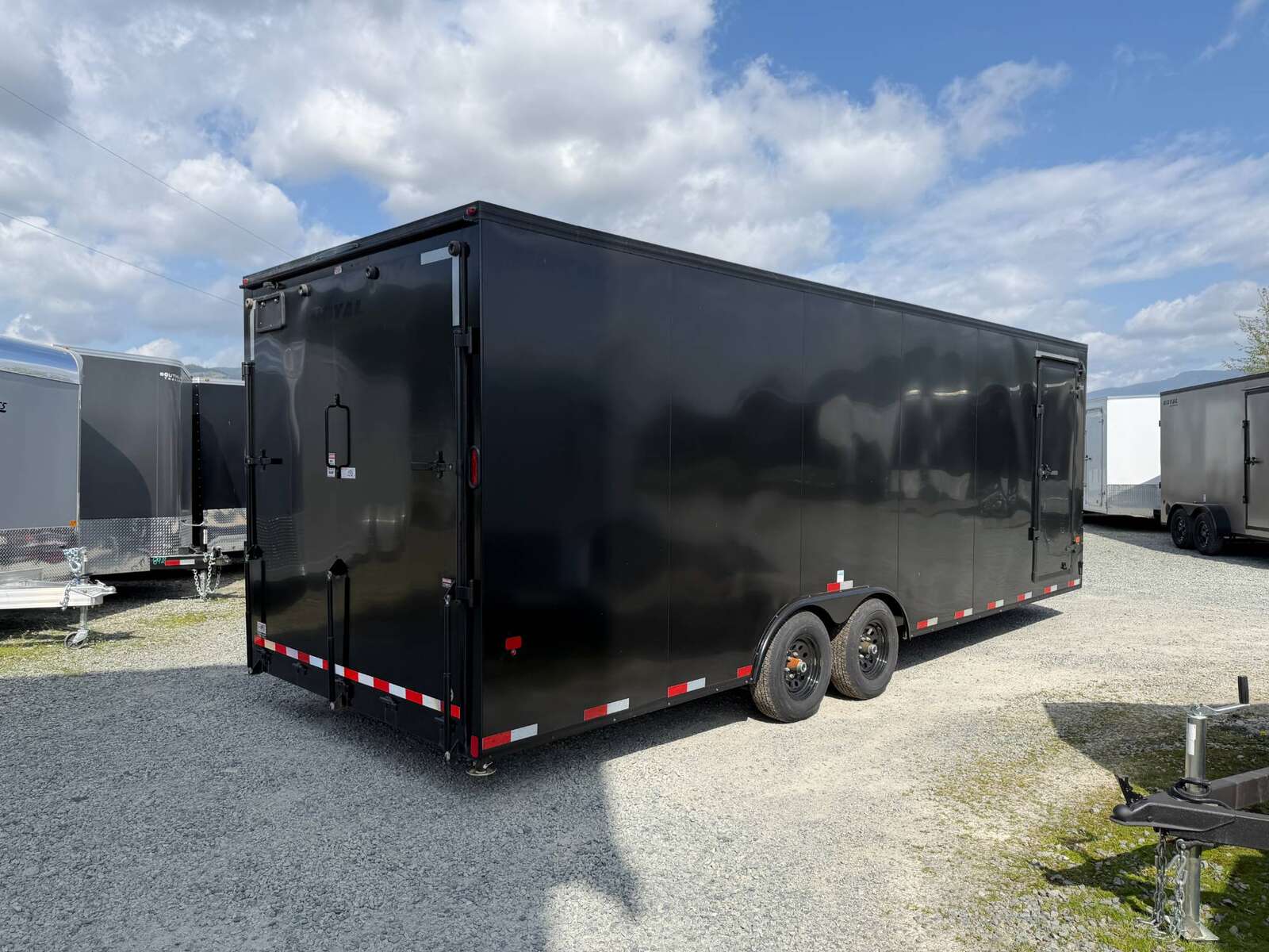 Photo of 2026 Royal Cargo 8.5x24 V Nose Car Hauler Cargo / Enclosed Trailer Blackout 11,400lb GVW Satin Black Ramp Door Extra Height (GSR)