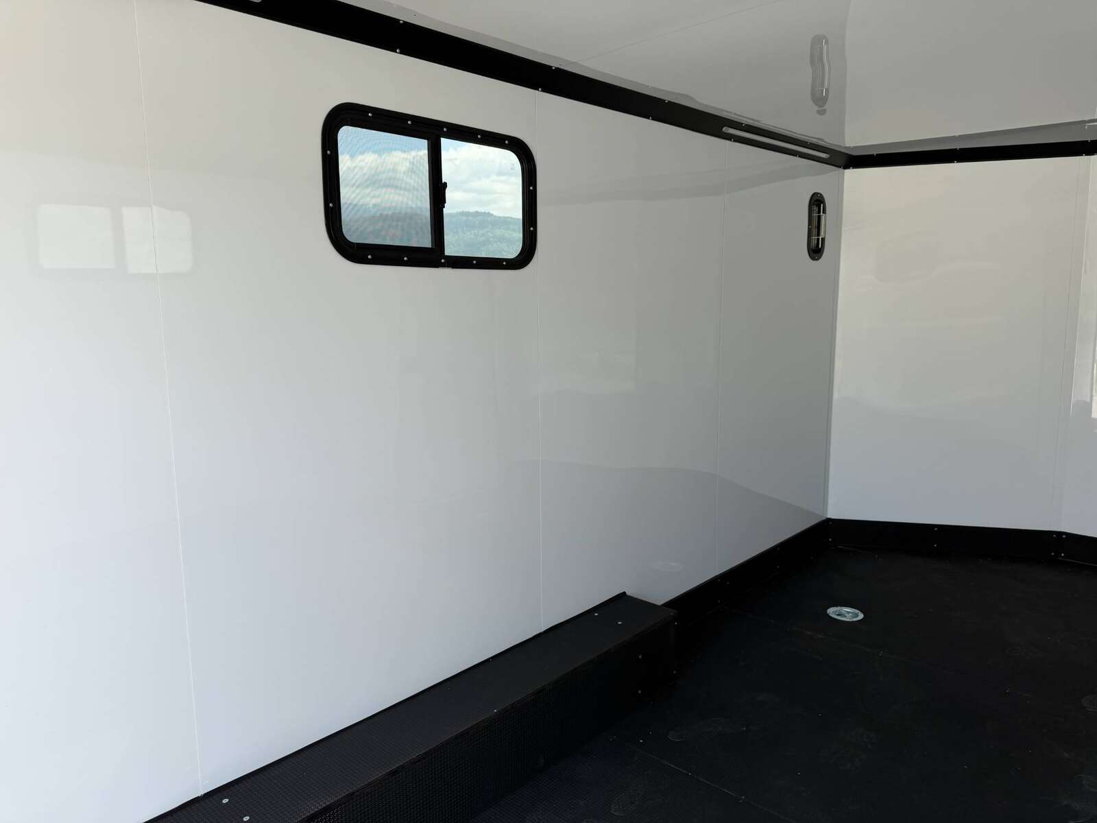 Photo of 2026 Royal 8.5x16 V Nose Cargo Enclosed Trailer Camping Package White w/ Blackout Pkg, Insulated, Ramp Door, White Walls, 2x Windows & More!