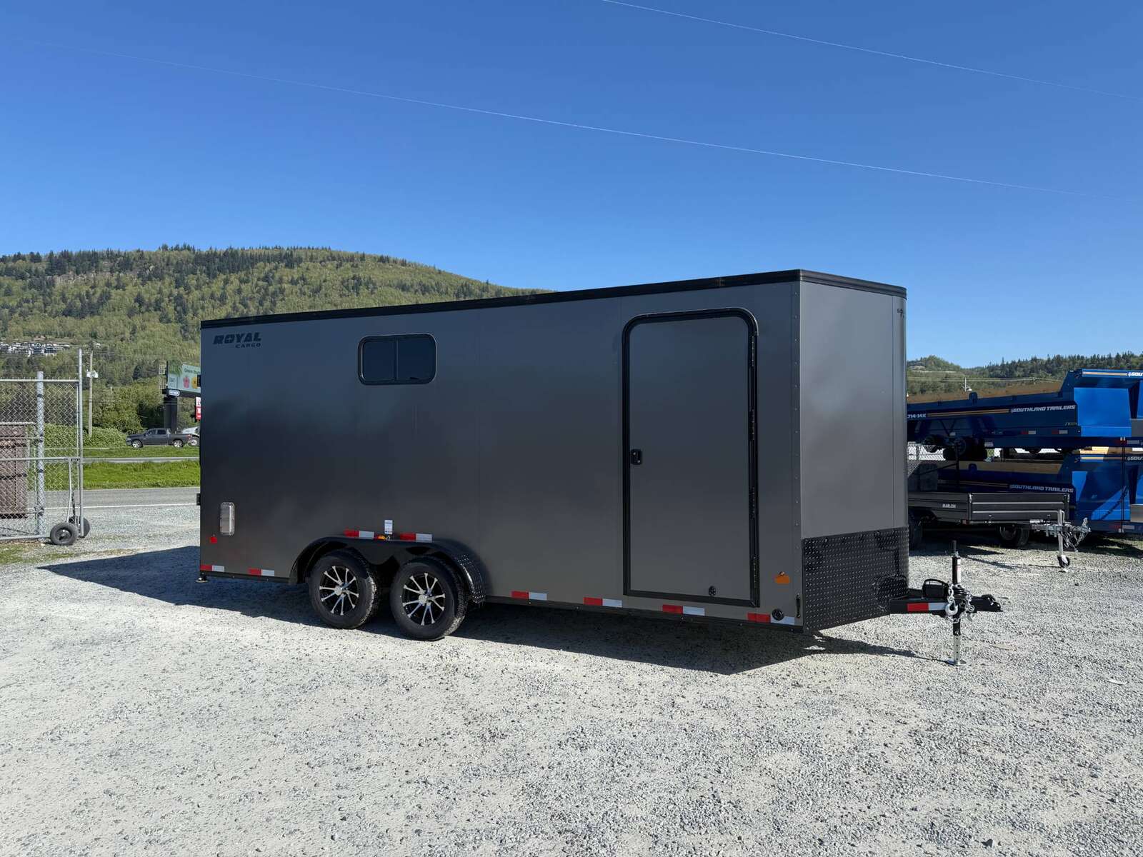 Photo of 2026 Royal 7.5x18 Cargo Enclosed Trailer Insulated Camping Package w/ Black Trim, Side Windows, Ramp Door, Charcoal Grey
