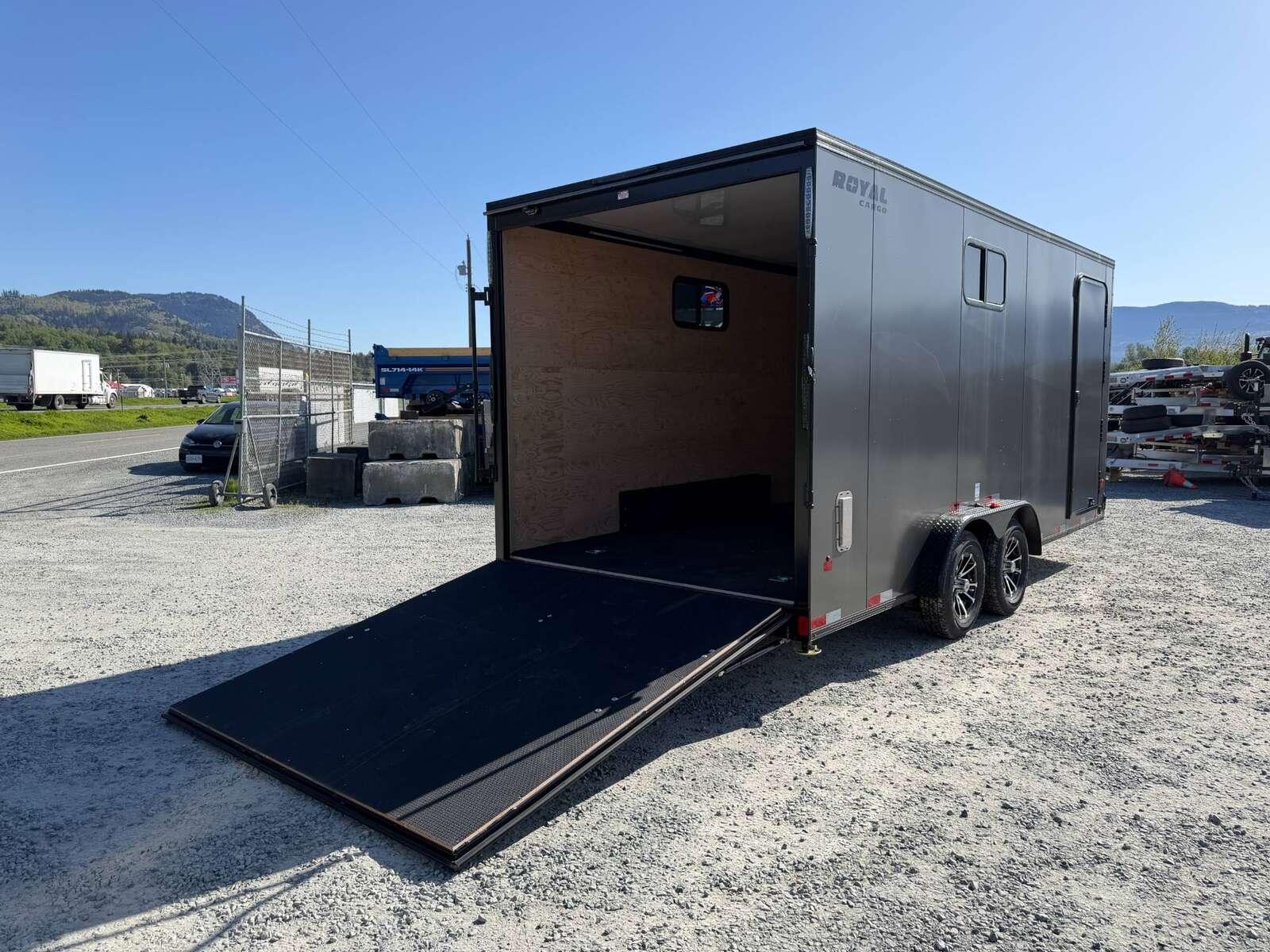 Photo of 2026 Royal 7.5x18 Cargo Enclosed Trailer Insulated Camping Package w/ Black Trim, Side Windows, Ramp Door, Charcoal Grey