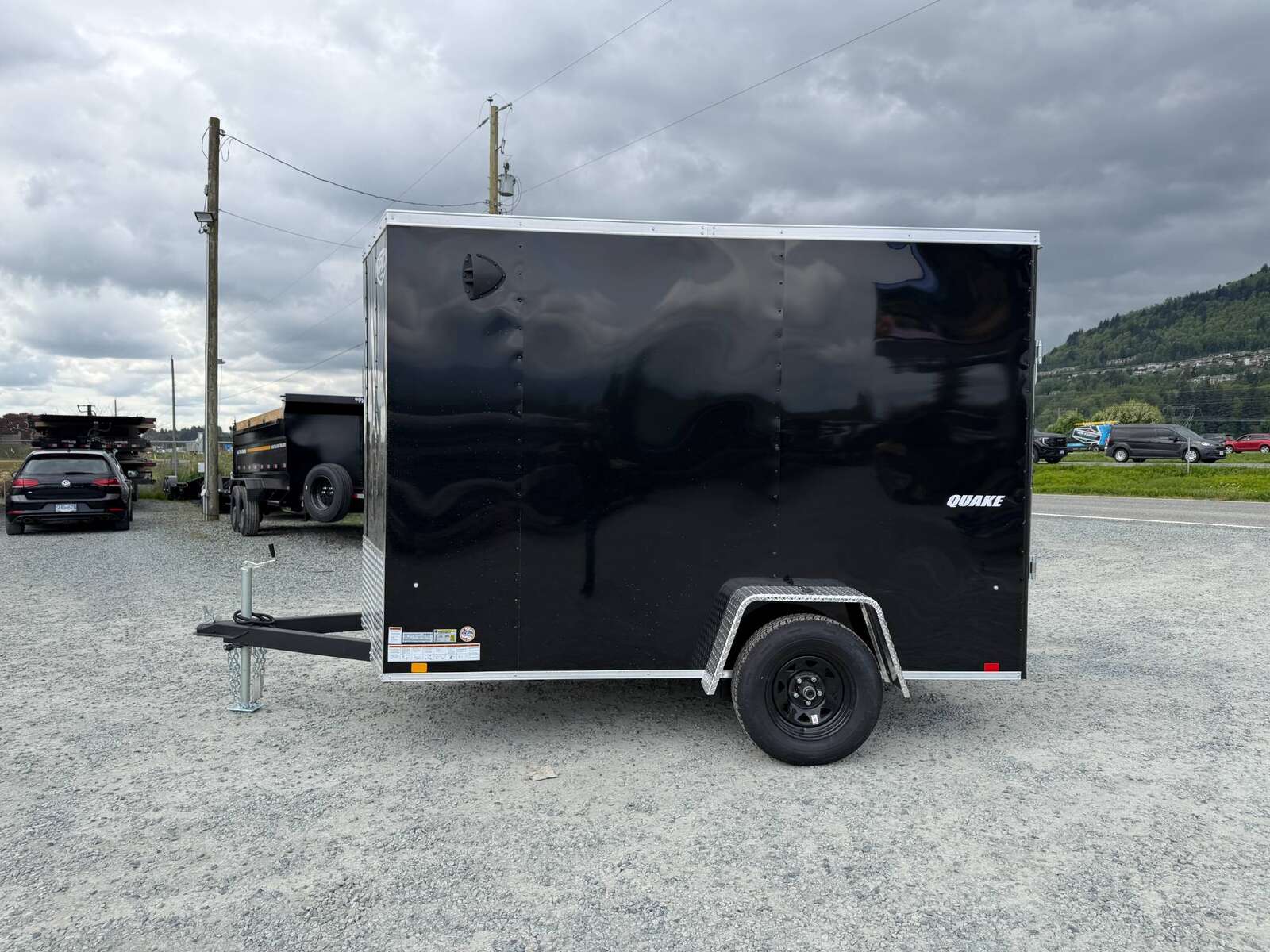 Photo of 2026 Impact Quake 6x10 V Nose Cargo / Enclosed Trailer Black Ramp Door Extra Height 2990lb GVW