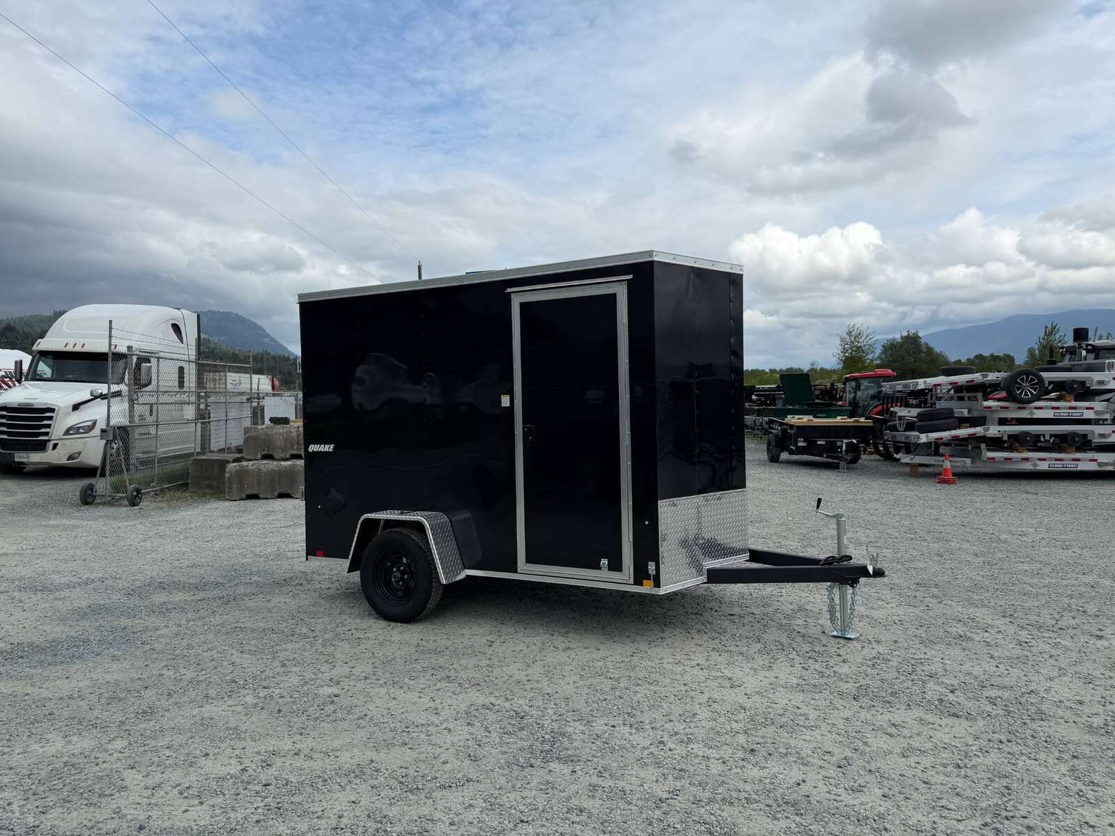 Photo of 2026 Impact Quake 6x10 V Nose Cargo / Enclosed Trailer Black Ramp Door Extra Height 2990lb GVW