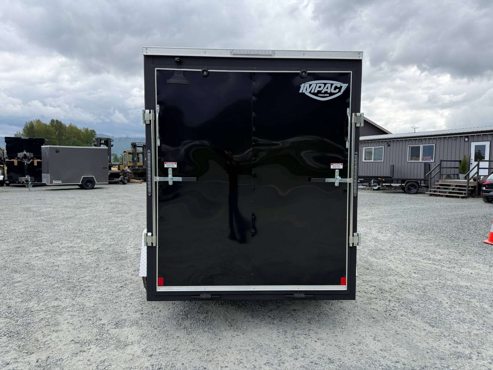 Photo of 2026 Impact Quake 6x10 V Nose Cargo / Enclosed Trailer Black Ramp Door Extra Height 2990lb GVW