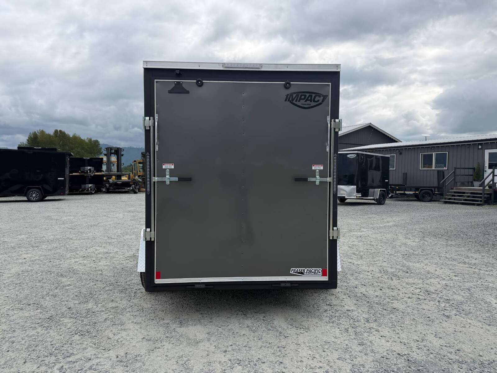 Photo of 2026 Impact Quake 6x10 V Nose Cargo / Enclosed Trailer Charcoal Grey Ramp Door Extra Height 2990lb GVW