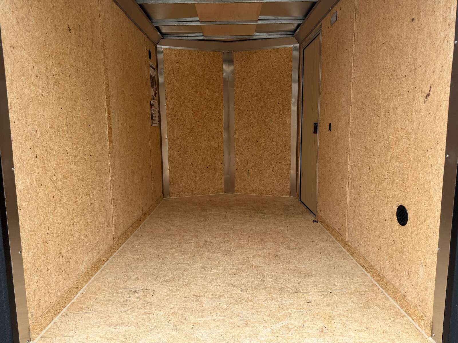 Photo of 2026 Impact Quake 6x10 V Nose Cargo / Enclosed Trailer Charcoal Grey Ramp Door Extra Height 2990lb GVW