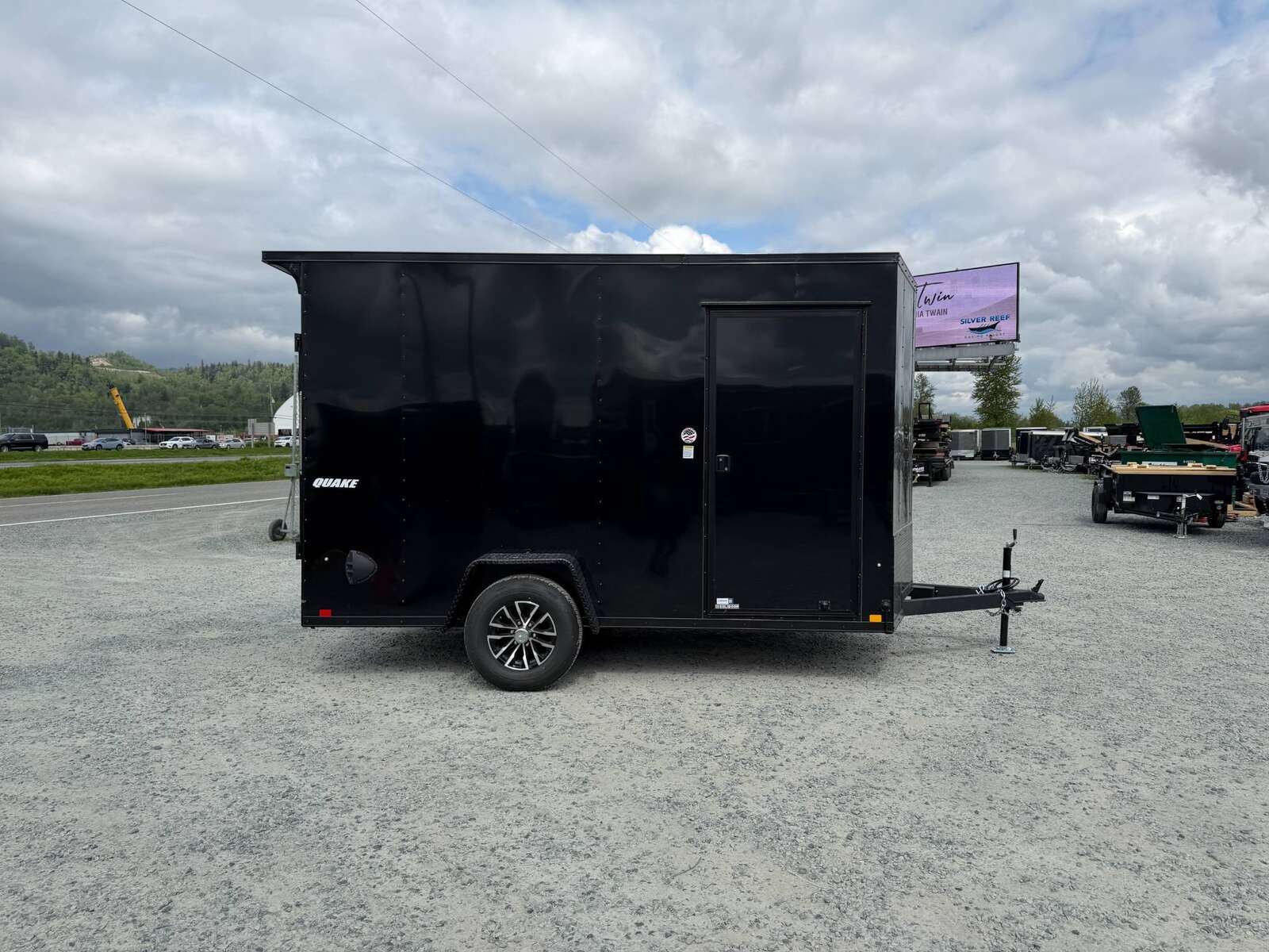 Photo of 2026 Impact Quake 7x12 V Nose Cargo / Enclosed Trailer 5000lb GVW w/ Ramp Door