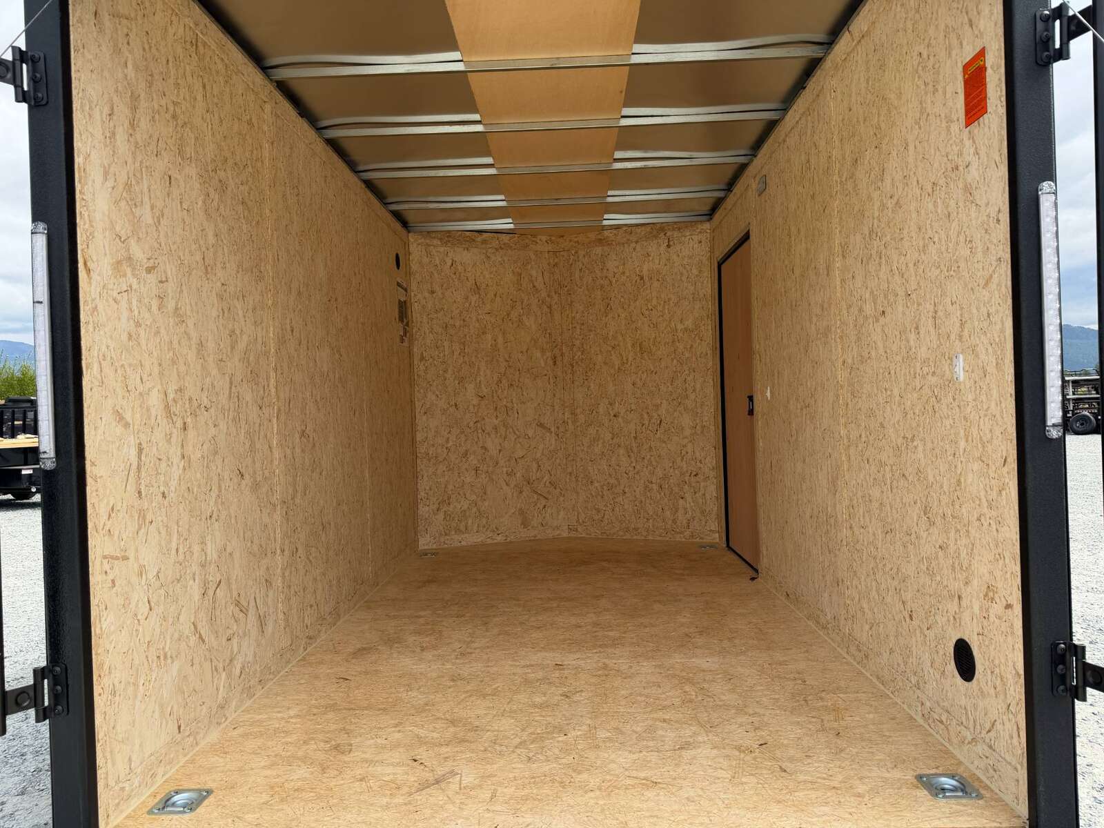 Photo of 2026 Impact Quake 7x12 V Nose Cargo / Enclosed Trailer 5000lb GVW w/ Ramp Door