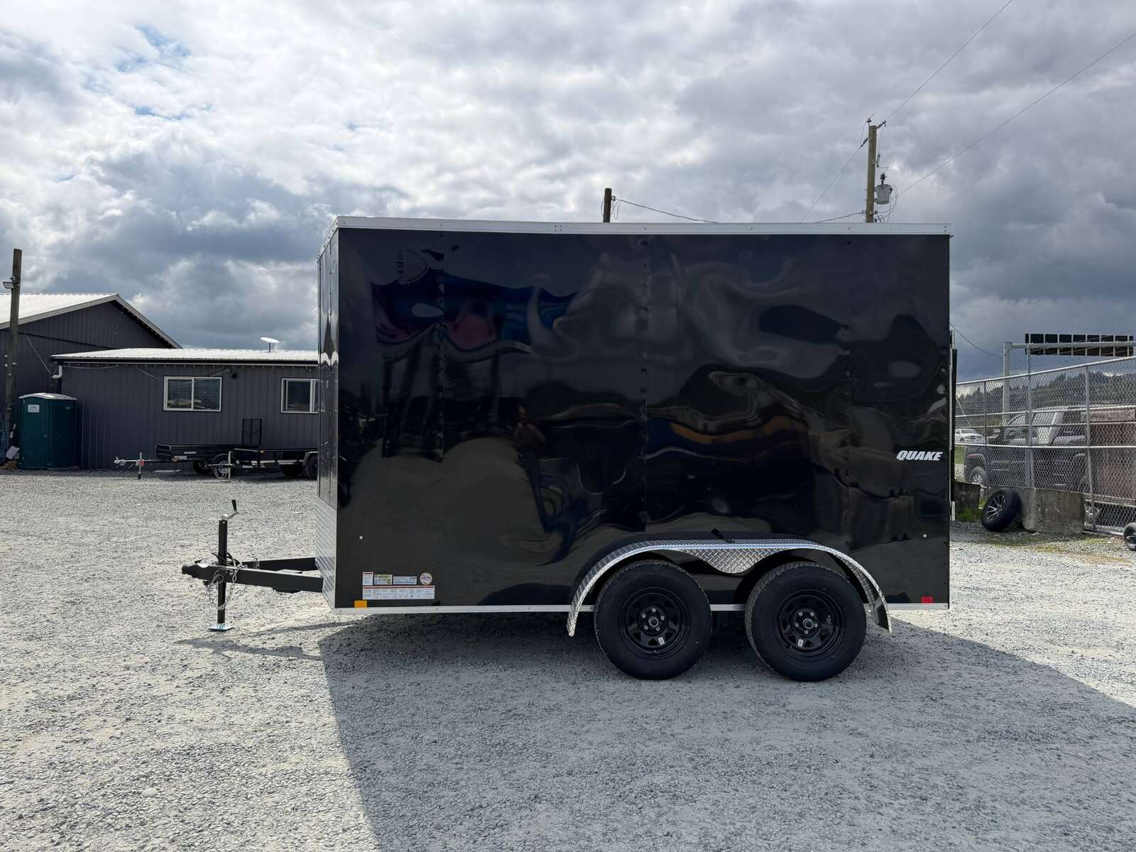 Photo of 2026 Impact Quake 7x12 Cargo Enclosed Trailer Tandem Axle 7000lb GVW Black Extra Height w/ Ramp Door