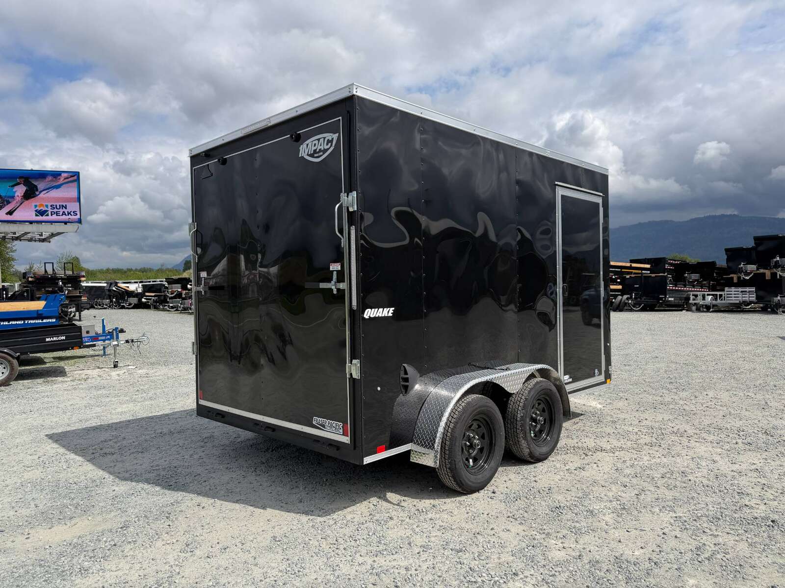 Photo of 2026 Impact Quake 7x12 Cargo Enclosed Trailer Tandem Axle 7000lb GVW Black Extra Height w/ Ramp Door