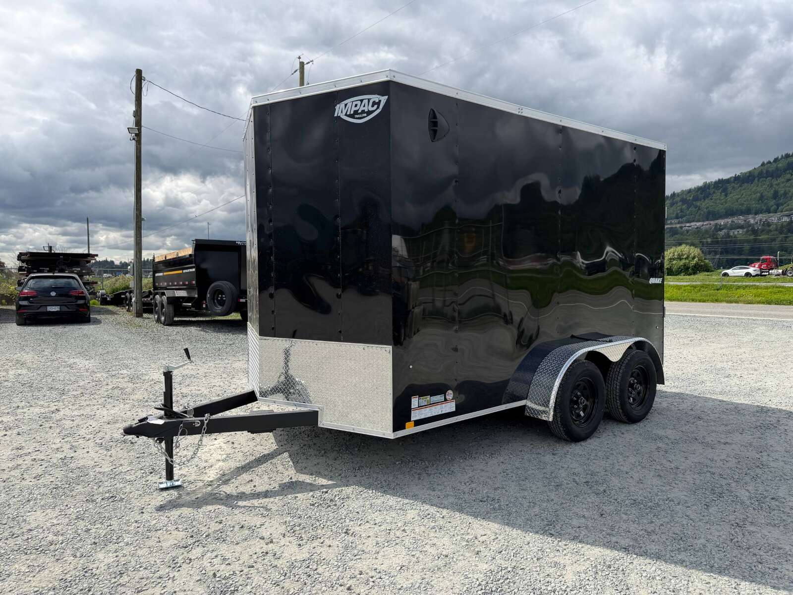Photo of 2026 Impact Quake 7x12 Cargo Enclosed Trailer Tandem Axle 7000lb GVW Black Extra Height w/ Ramp Door