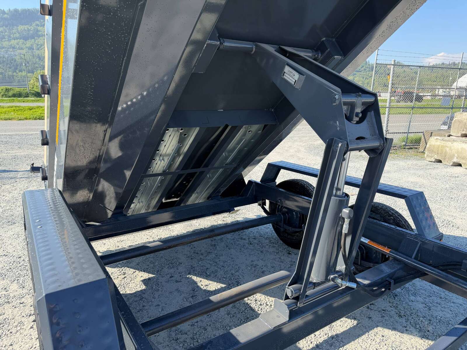 Photo of 2026 Southland 6X12 Dump Trailer 11,400LB GVW with Tarp and Ramps Charcoal Grey