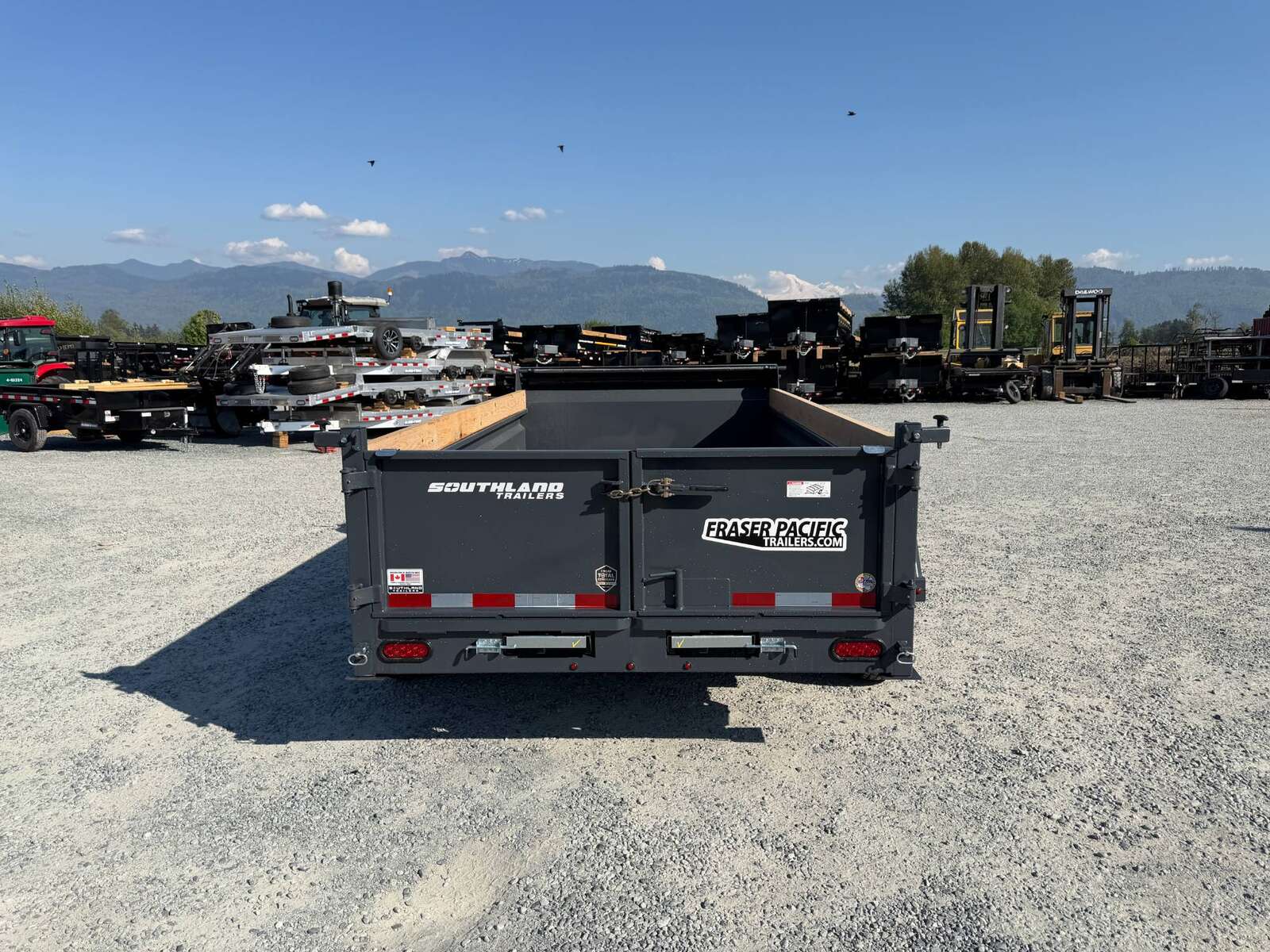 Photo of 2026 Southland 6X12 Dump Trailer 11,400LB GVW with Tarp and Ramps Charcoal Grey