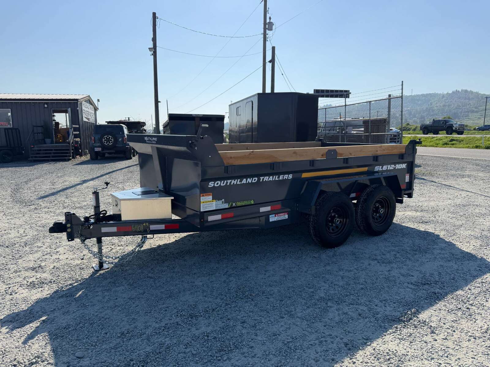 Photo of 2026 Southland 6X12 Dump Trailer 11,400LB GVW with Tarp and Ramps Charcoal Grey