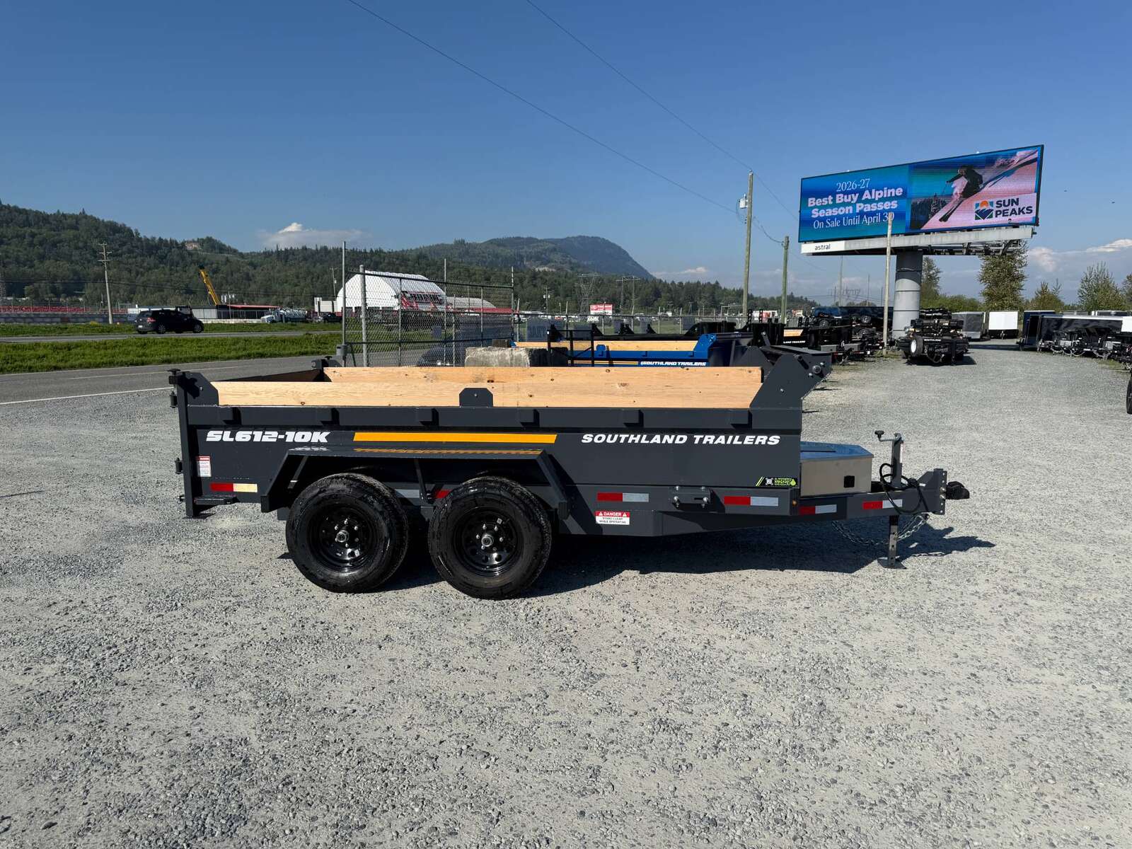 Photo of 2026 Southland 6X12 Dump Trailer 11,400LB GVW with Tarp and Ramps Charcoal Grey
