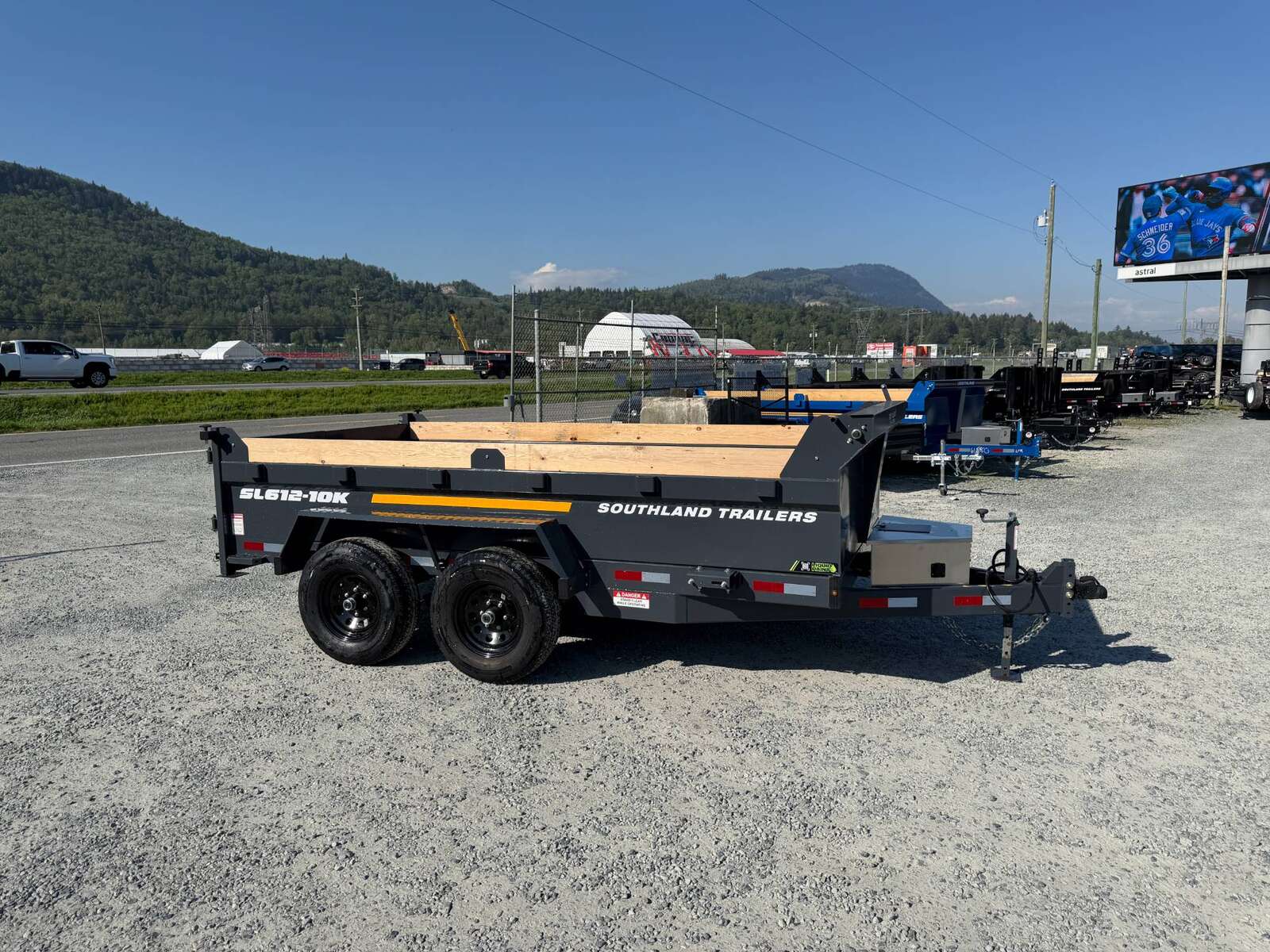 Photo of 2026 Southland 6X12 Dump Trailer 11,400LB GVW with Tarp and Ramps Charcoal Grey