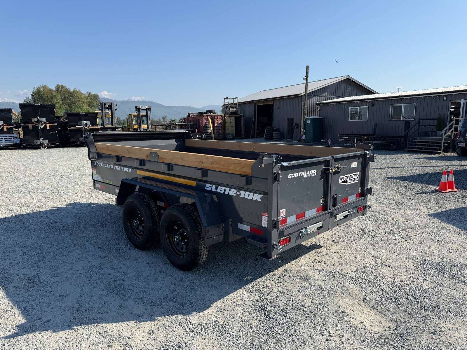 Photo of 2026 Southland 6X12 Dump Trailer 11,400LB GVW with Tarp and Ramps Charcoal Grey