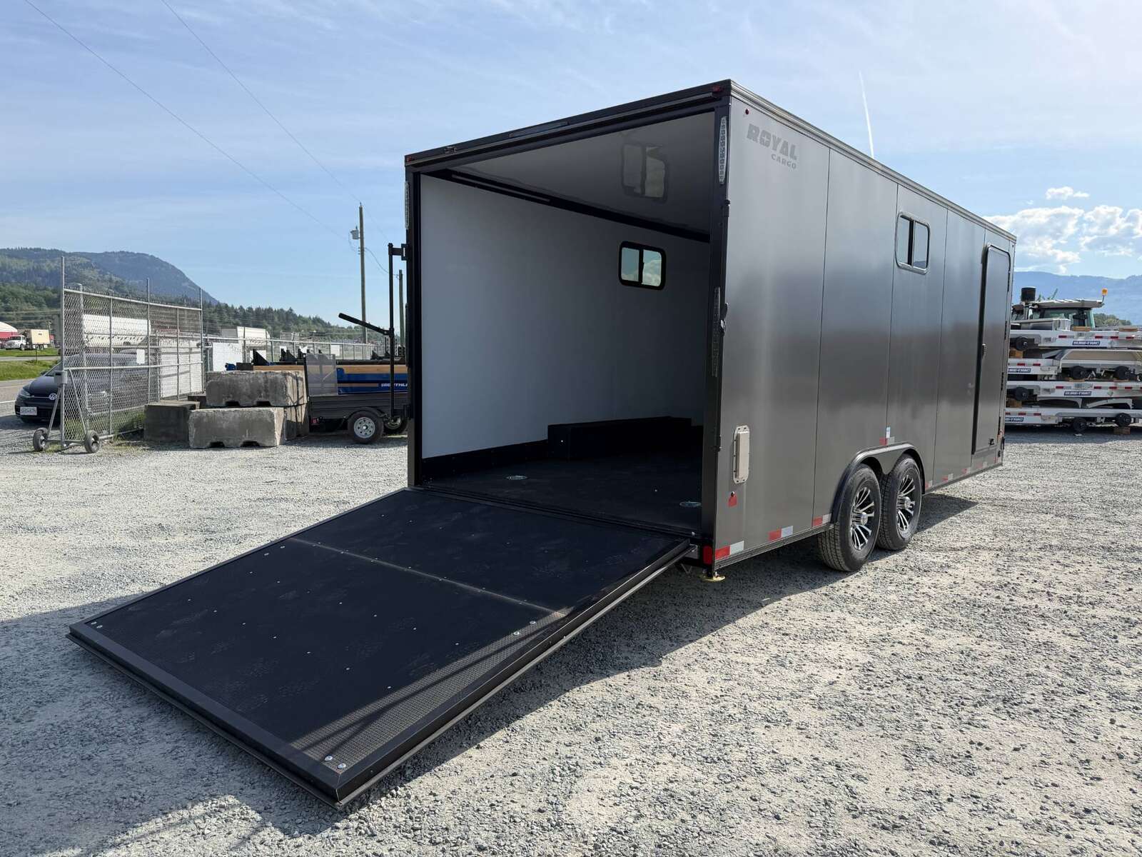 Photo of 2026 Royal 8.5x20 V Nose Cargo Enclosed Trailer Camping Package Charcoal Grey w/ Blackout Pkg, Insulated, Ramp Door, White Walls, 2x Windows & More!