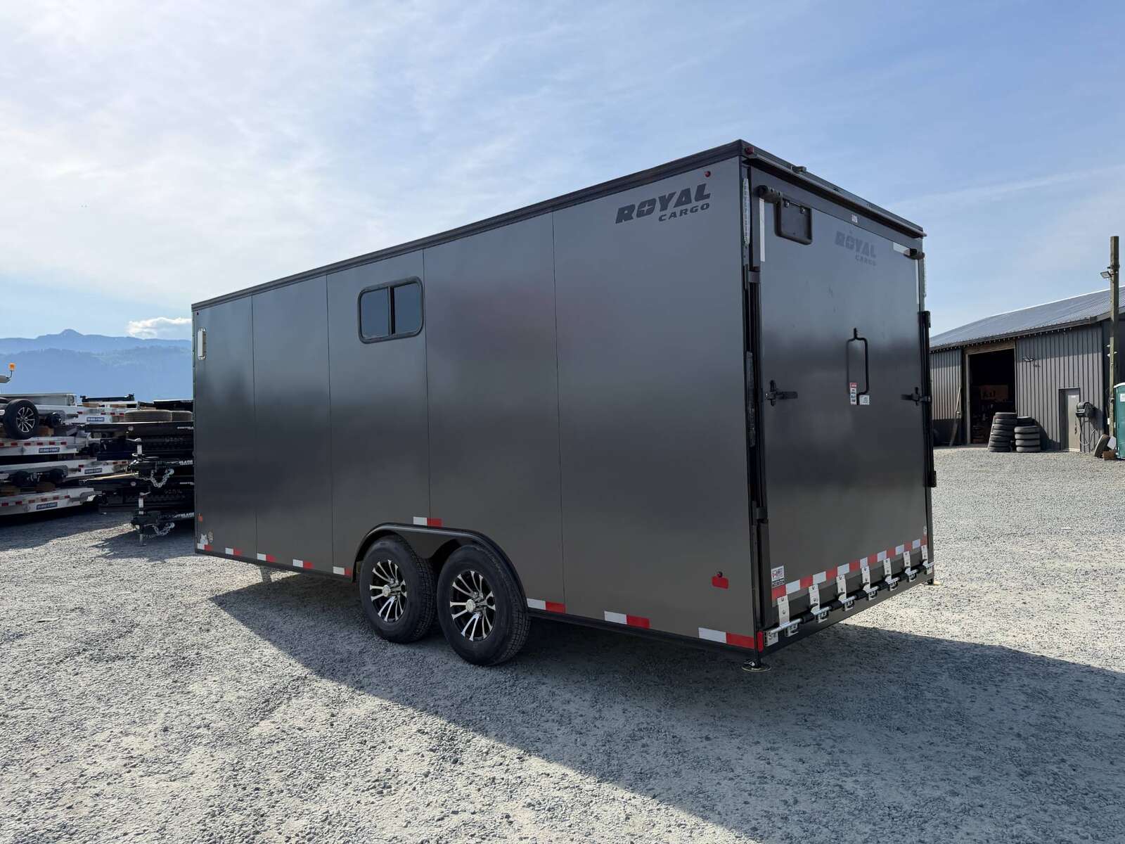Photo of 2026 Royal 8.5x20 V Nose Cargo Enclosed Trailer Camping Package Charcoal Grey w/ Blackout Pkg, Insulated, Ramp Door, White Walls, 2x Windows & More!