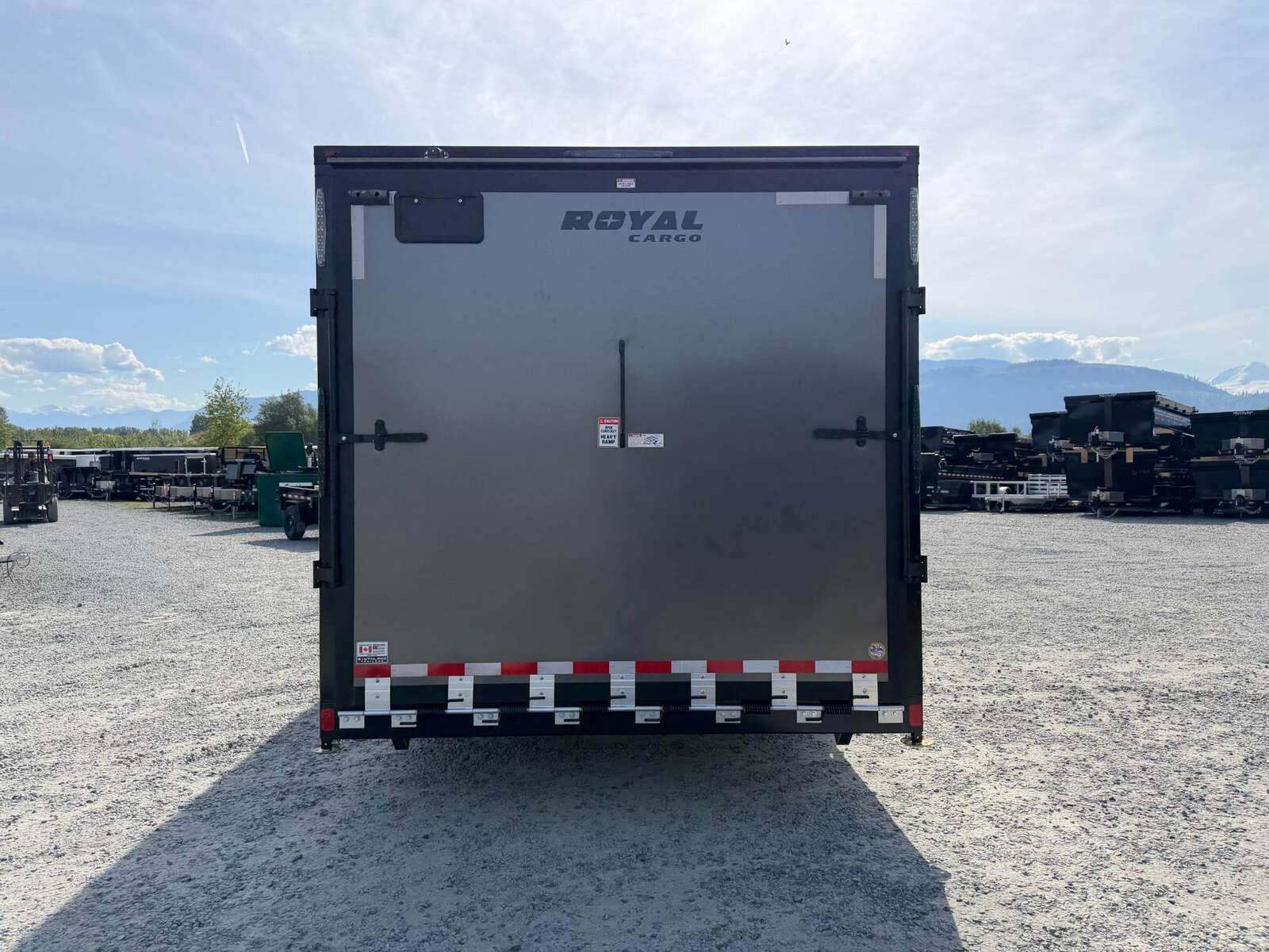 Photo of 2026 Royal 8.5x20 V Nose Cargo Enclosed Trailer Camping Package Charcoal Grey w/ Blackout Pkg, Insulated, Ramp Door, White Walls, 2x Windows & More!