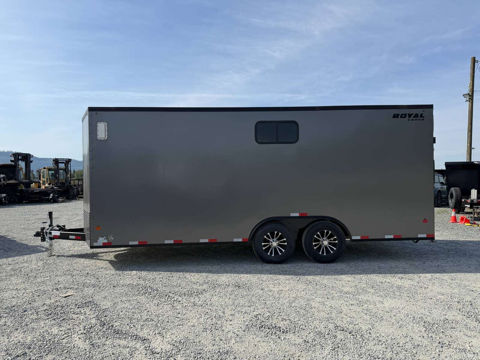 Photo of 2026 Royal 8.5x20 V Nose Cargo Enclosed Trailer Camping Package Charcoal Grey w/ Blackout Pkg, Insulated, Ramp Door, White Walls, 2x Windows & More!