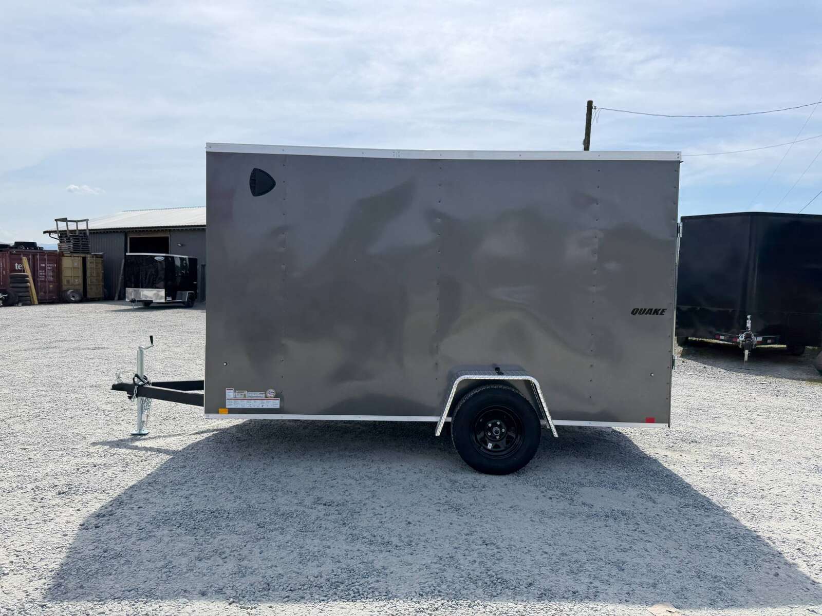 Photo of 2026 Impact Quake 6x12 V Nose Cargo / Enclosed Trailer Charcoal Grey Ramp Door Extra Height 2990lb GVW