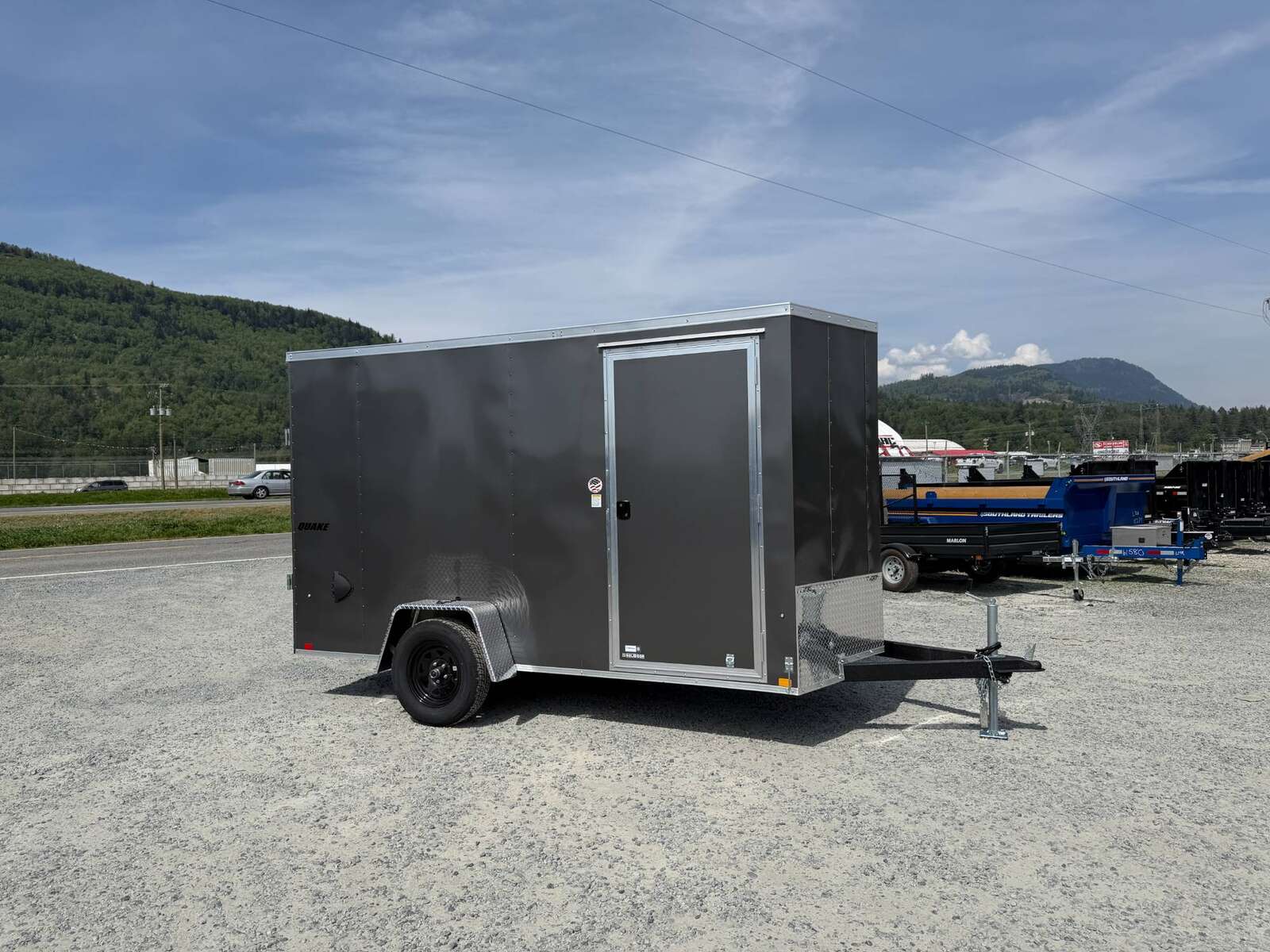 Photo of 2026 Impact Quake 6x12 V Nose Cargo / Enclosed Trailer Charcoal Grey Ramp Door Extra Height 2990lb GVW