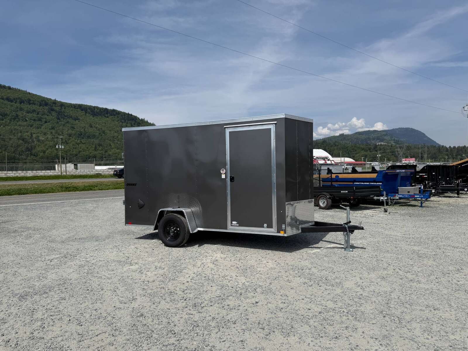 Photo of 2026 Impact Quake 6x12 V Nose Cargo / Enclosed Trailer Charcoal Grey Ramp Door Extra Height 2990lb GVW