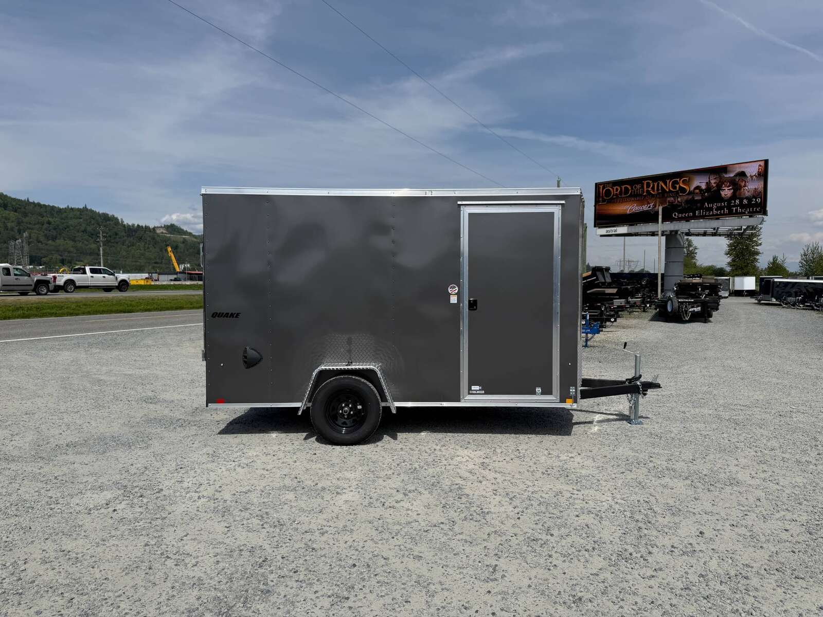 Photo of 2026 Impact Quake 6x12 V Nose Cargo / Enclosed Trailer Charcoal Grey Ramp Door Extra Height 2990lb GVW