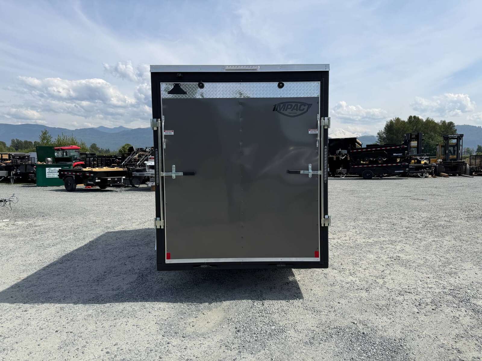 Photo of 2026 Impact Quake 6x12 V Nose Cargo / Enclosed Trailer Charcoal Grey Ramp Door Extra Height 2990lb GVW