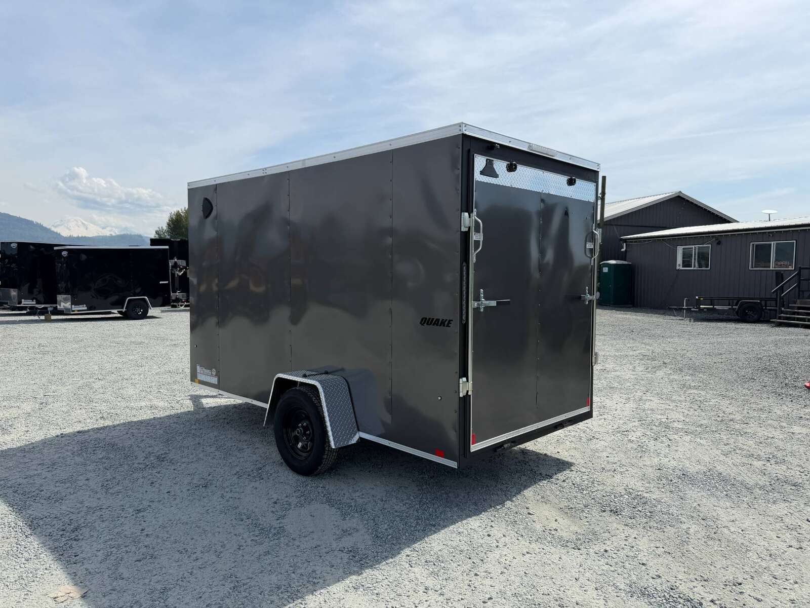 Photo of 2026 Impact Quake 6x12 V Nose Cargo / Enclosed Trailer Charcoal Grey Ramp Door Extra Height 2990lb GVW
