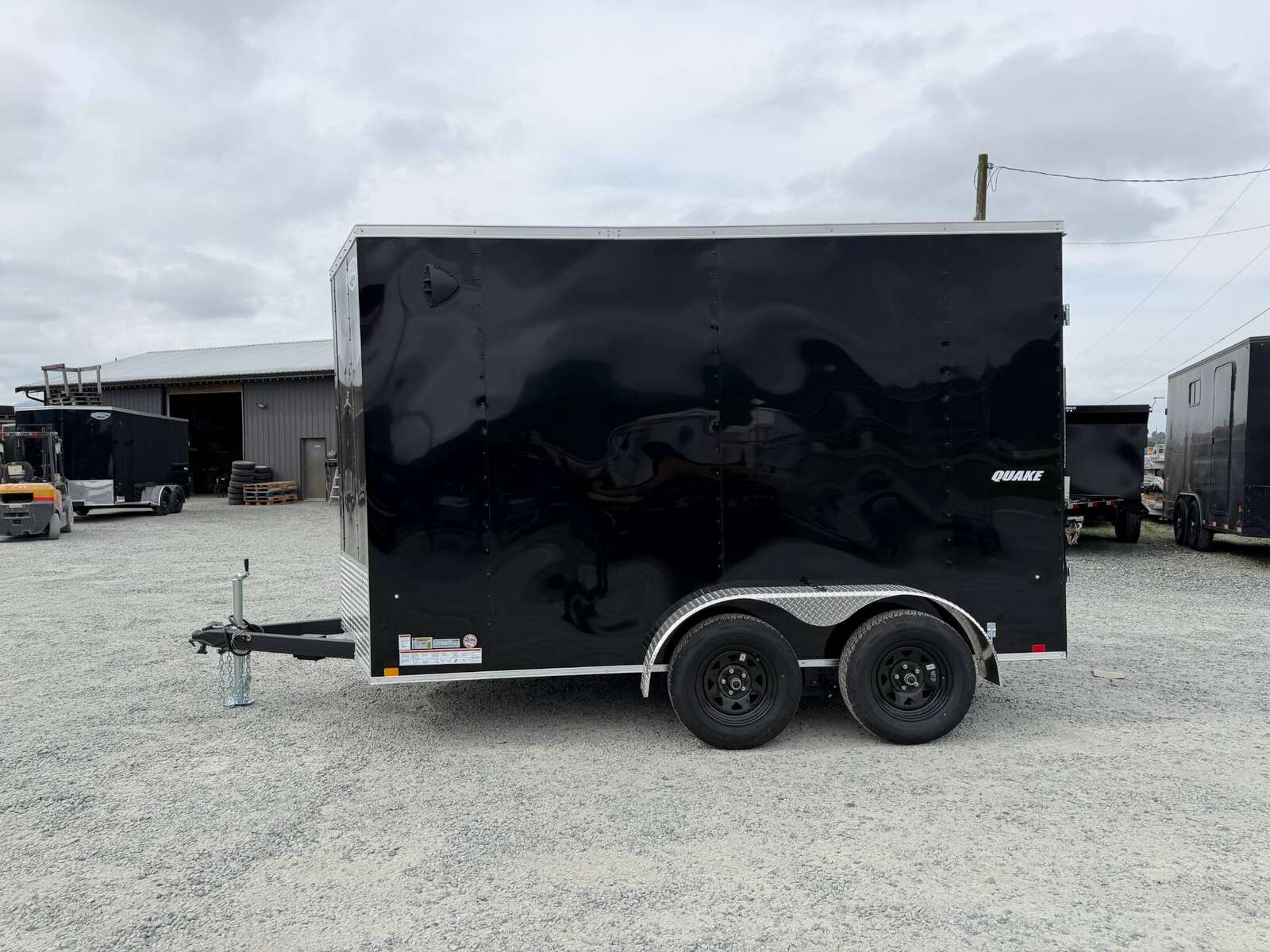 Photo of 2026 Impact Quake 7x12 Cargo Enclosed Trailer Tandem Axle 7000lb GVW Black Extra Height w/ Barn Doors