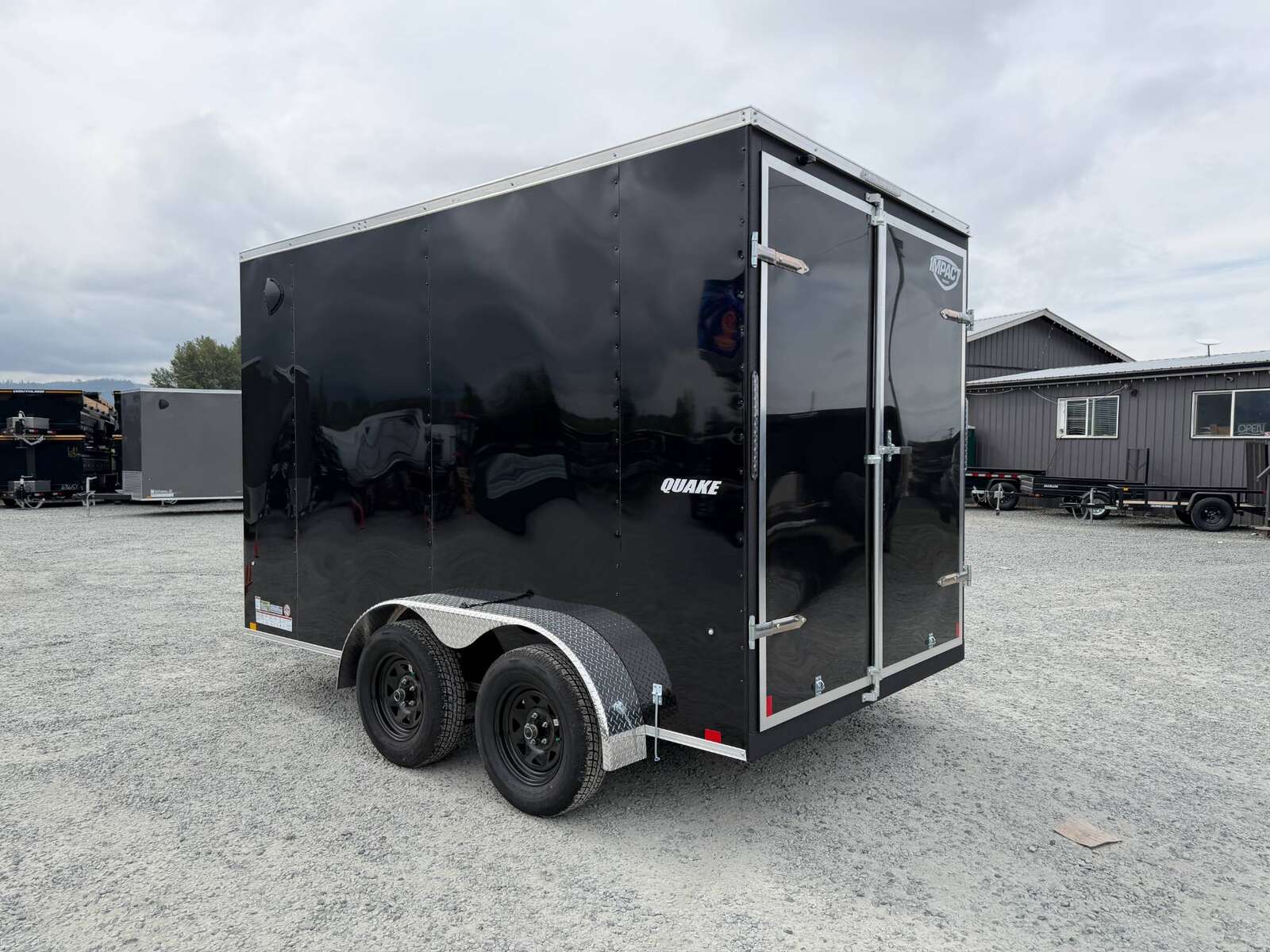 Photo of 2026 Impact Quake 7x12 Cargo Enclosed Trailer Tandem Axle 7000lb GVW Black Extra Height w/ Barn Doors