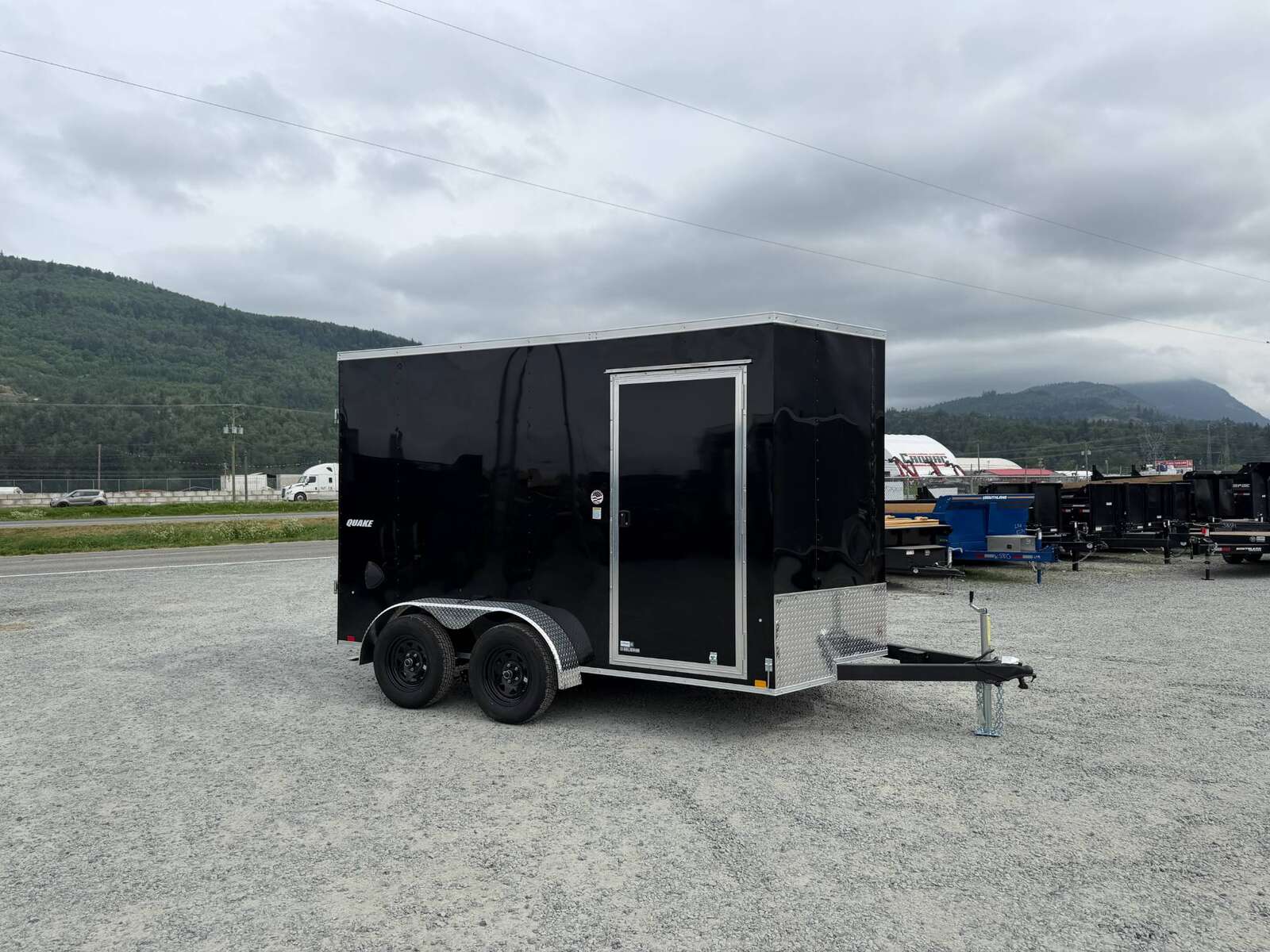 Photo of 2026 Impact Quake 7x12 Cargo Enclosed Trailer Tandem Axle 7000lb GVW Black Extra Height w/ Barn Doors