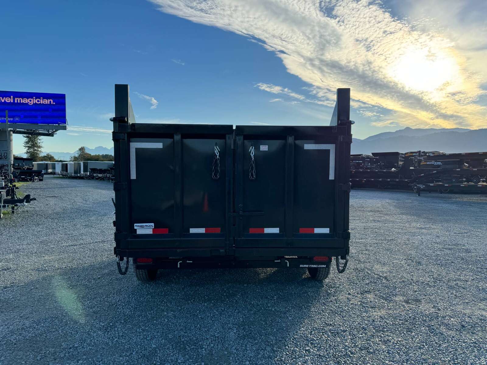 Photo of 2026 Suretrac 7x12 Telescopic High Side Dump Trailer 15,500lb GVW w/ Tarp and Ramps