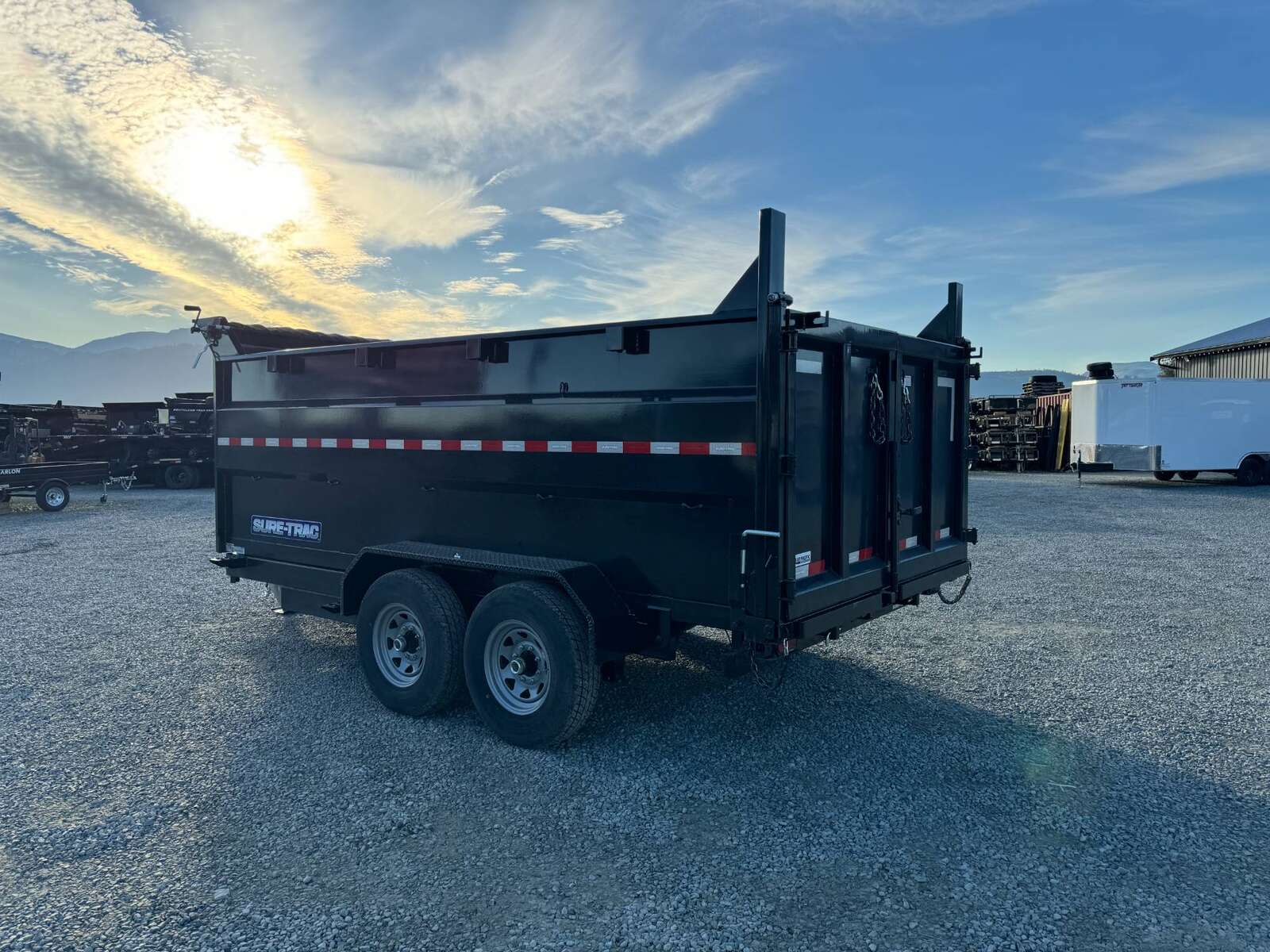 Photo of 2026 Suretrac 7x12 Telescopic High Side Dump Trailer 15,500lb GVW w/ Tarp and Ramps