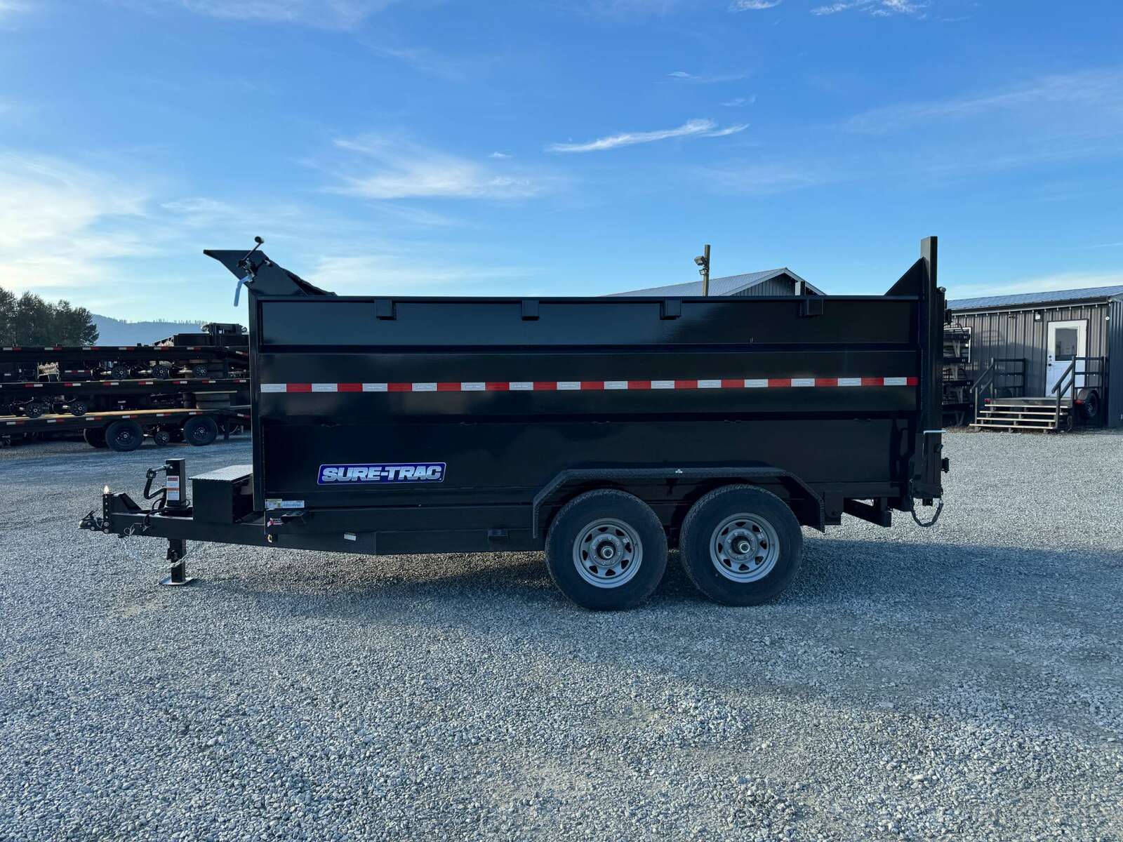 Photo of 2026 Suretrac 7x12 Telescopic High Side Dump Trailer 15,500lb GVW w/ Tarp and Ramps