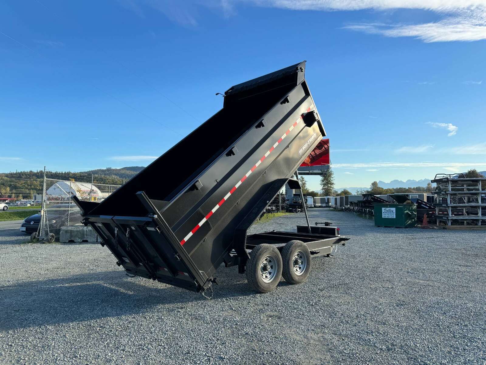 Photo of 2026 Suretrac 7x12 Telescopic High Side Dump Trailer 15,500lb GVW w/ Tarp and Ramps