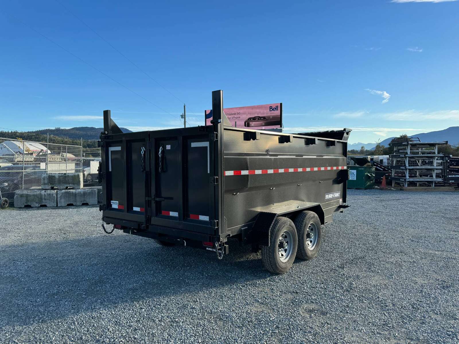 Photo of 2026 Suretrac 7x12 Telescopic High Side Dump Trailer 15,500lb GVW w/ Tarp and Ramps