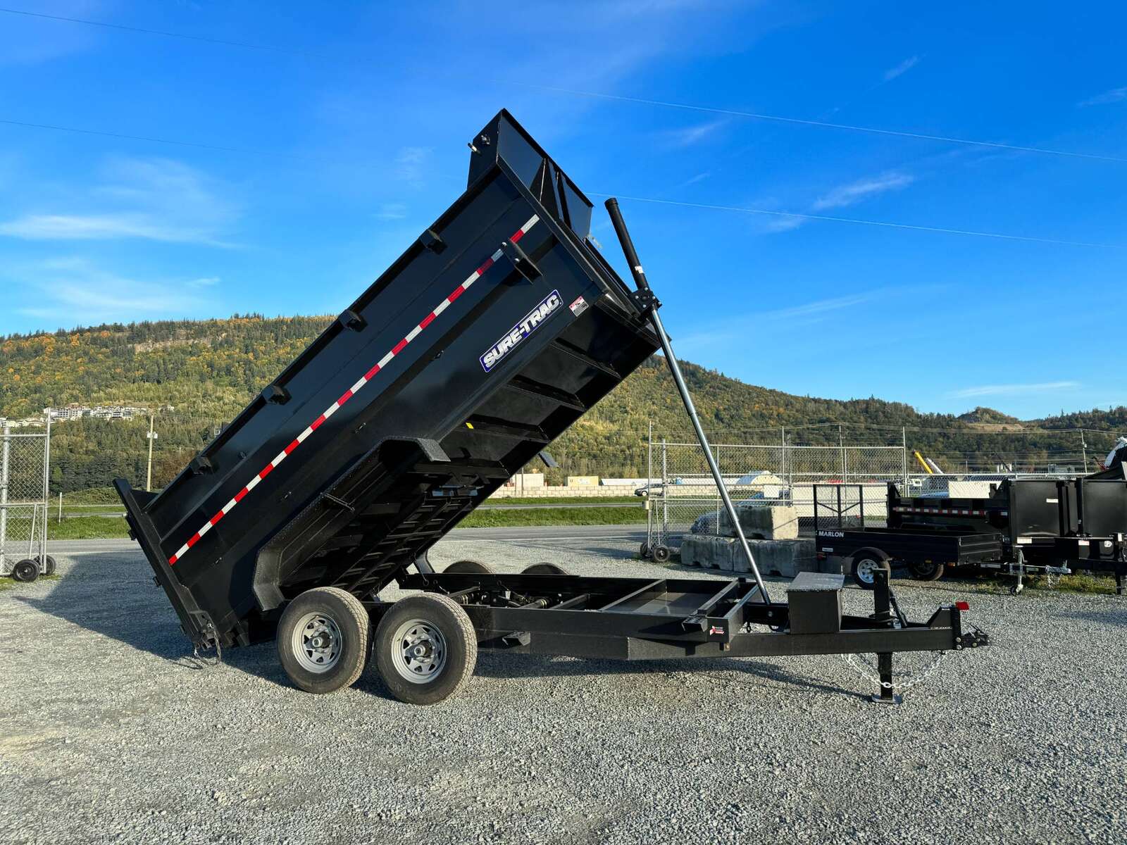 Photo of 2026 Suretrac 7x12 Telescopic High Side Dump Trailer 15,500lb GVW w/ Tarp and Ramps