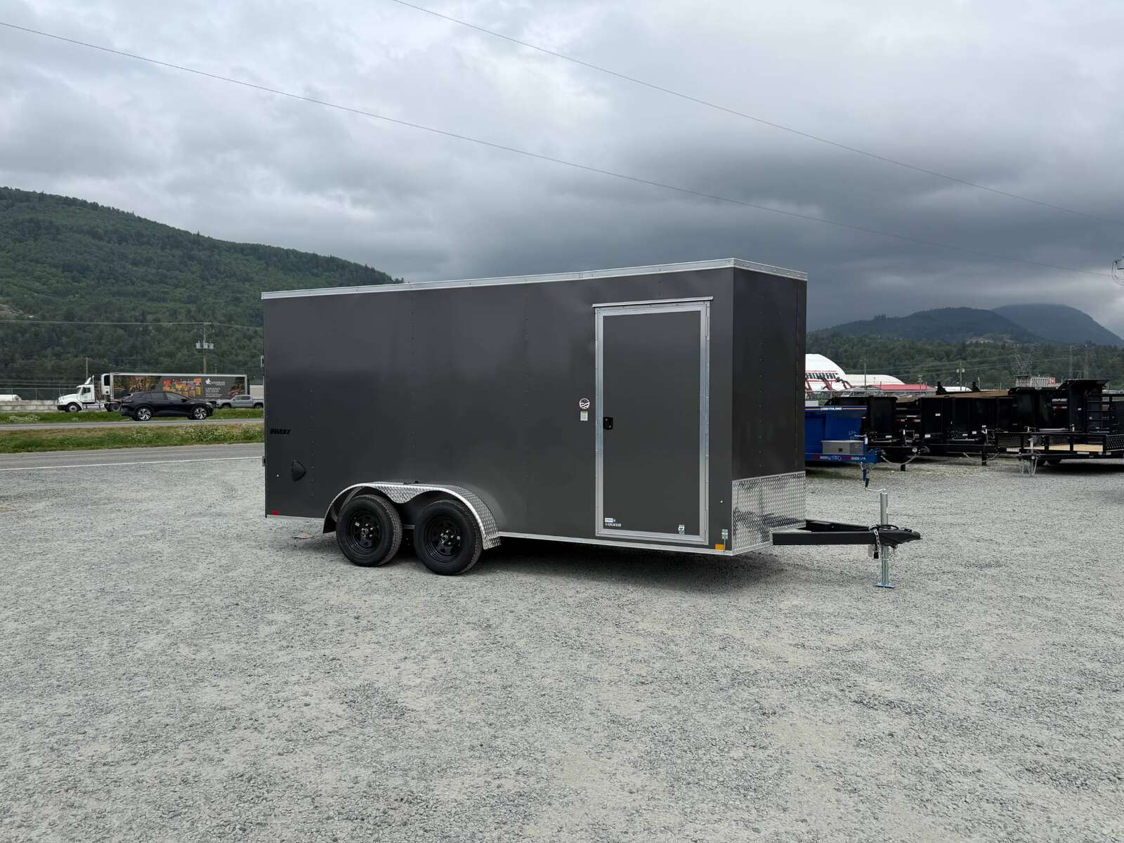 Photo of 2026 Impact Quake 7X16 V-Nose Ramp Door Cargo / Enclosed Trailer Extra Height Charcoal Grey 7000lb GVW